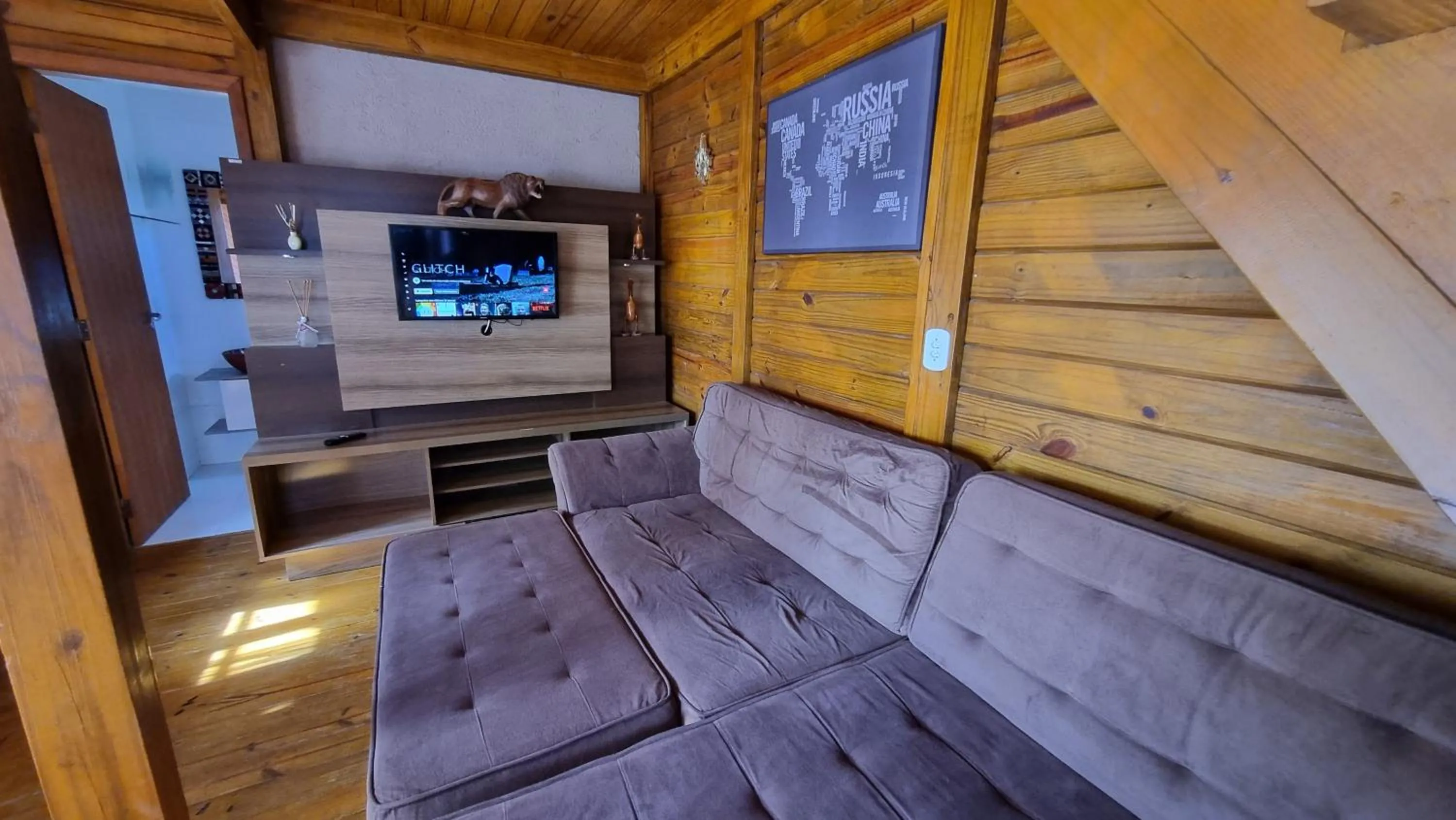 TV and multimedia in Arte da Tribo Hostel & Camping