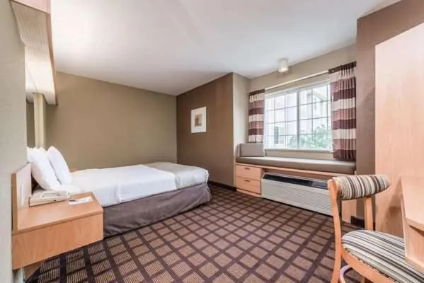 Bed in Microtel Inn & Suites by Wyndham West Chester
