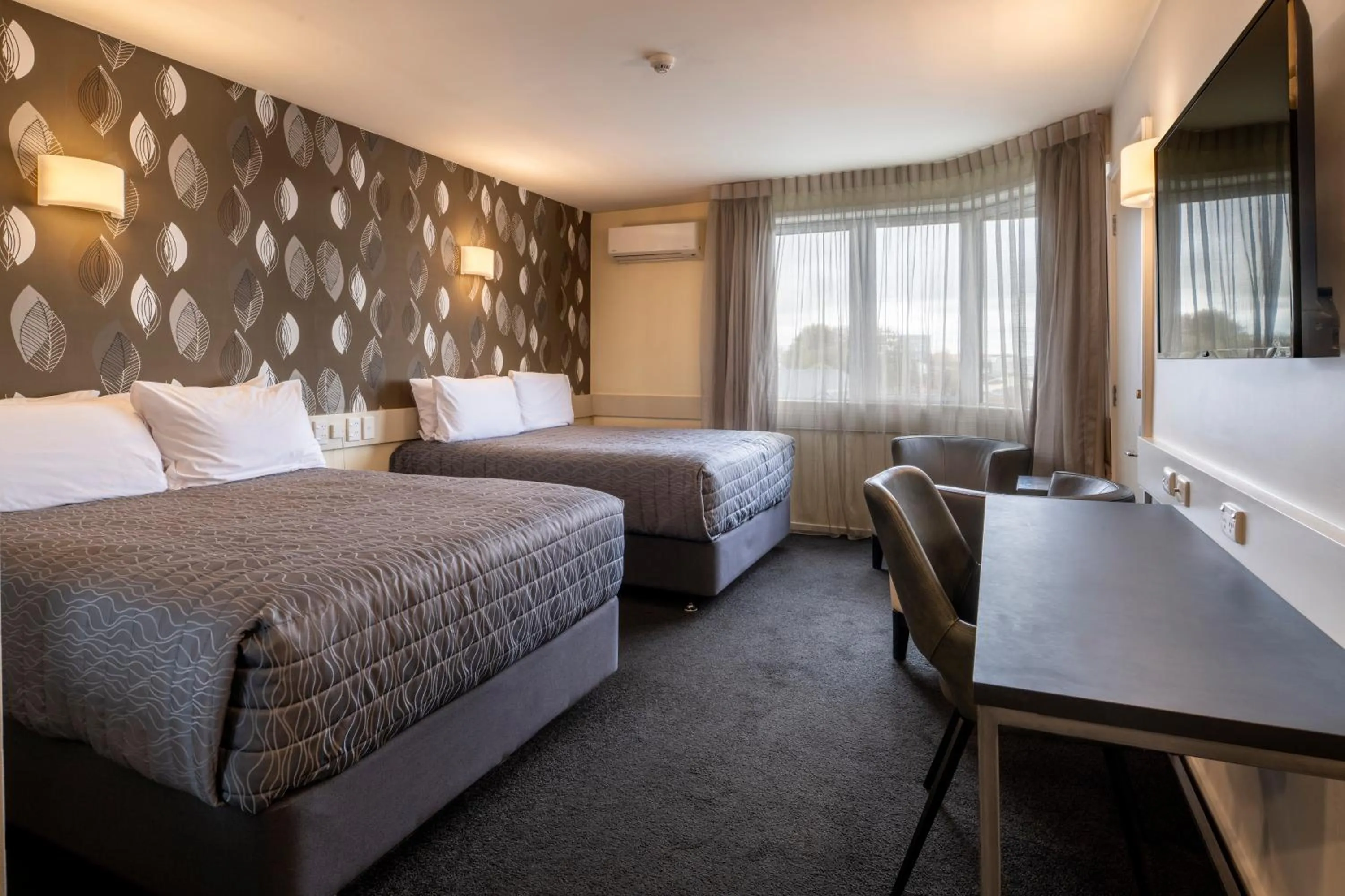 Bed in Hotel Elms Christchurch, an Ascend Collection Hotel