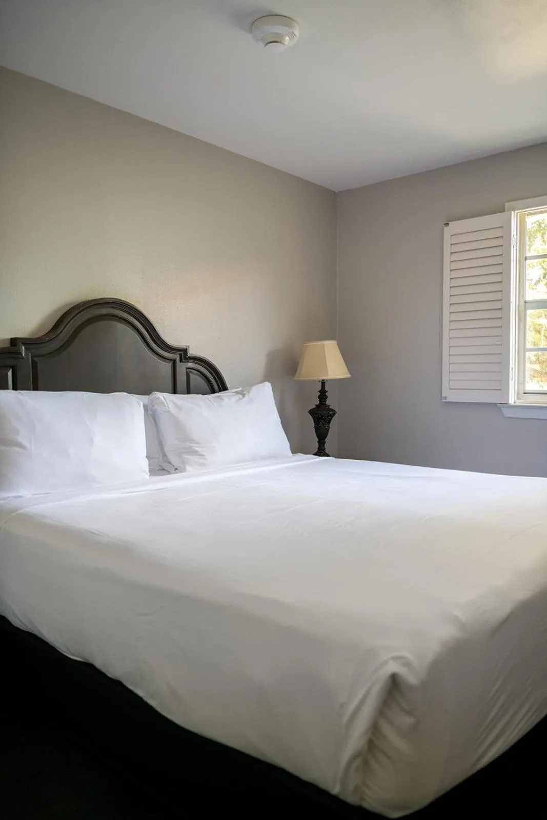 Bed in French Quarter Suites Hotel