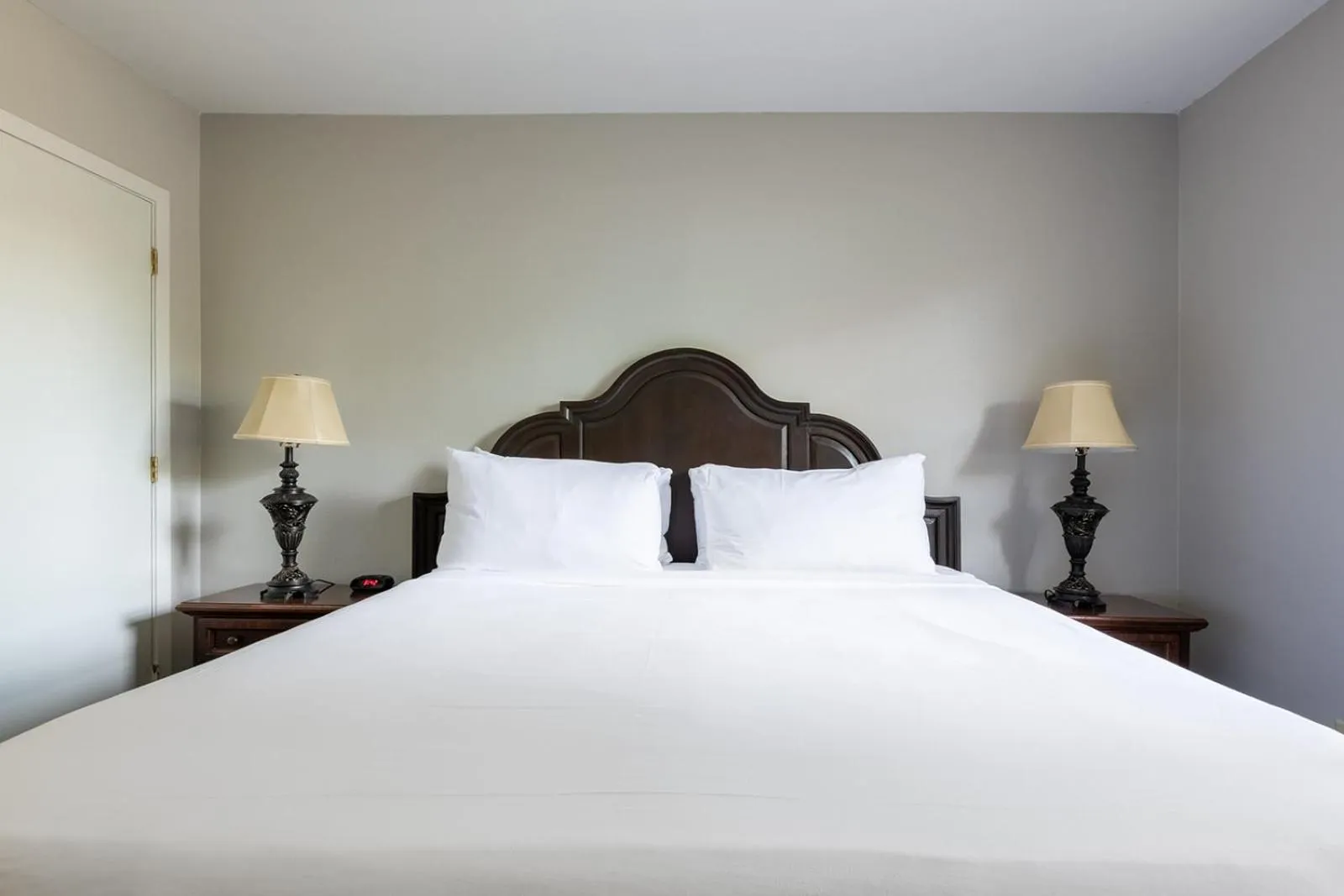 Bed in French Quarter Suites Hotel