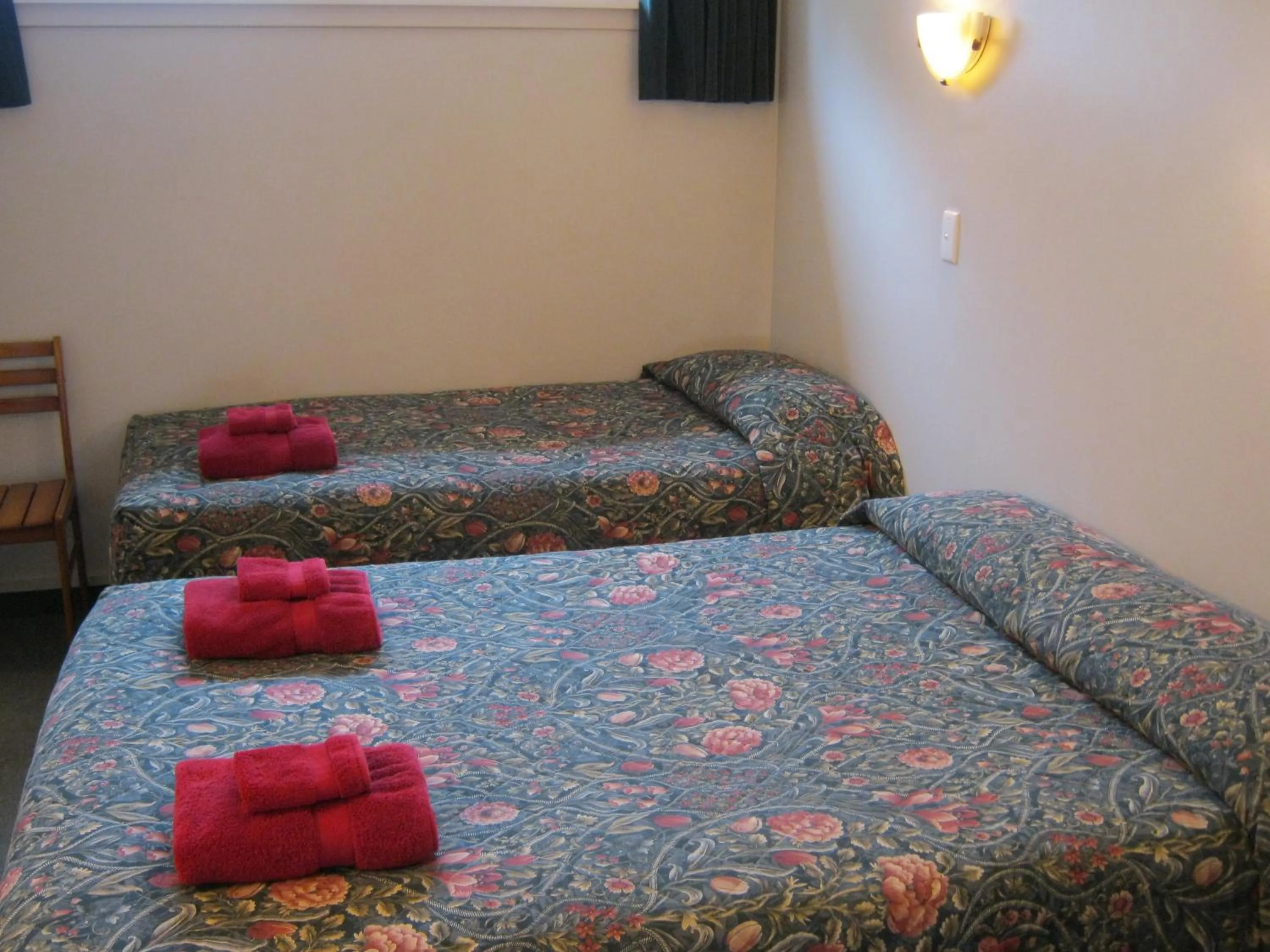 Bed in Blue Dolphin Motel