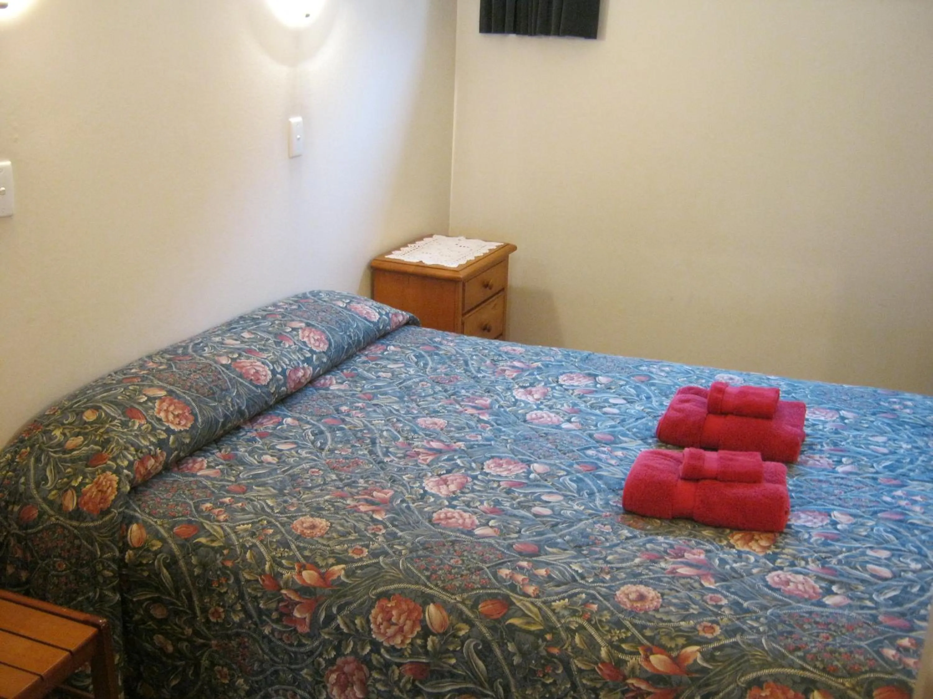 Bed in Blue Dolphin Motel