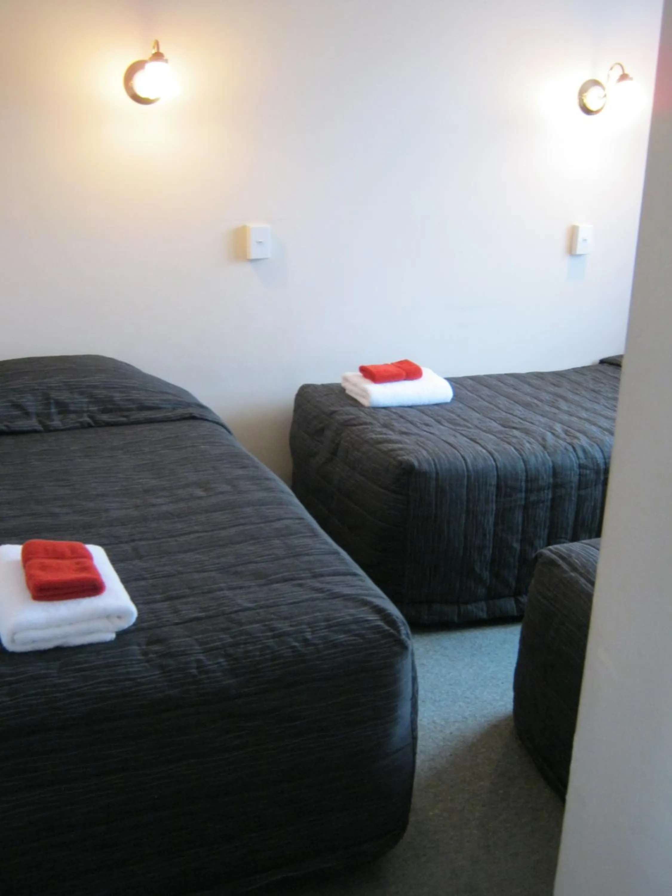 Bed in Blue Dolphin Motel