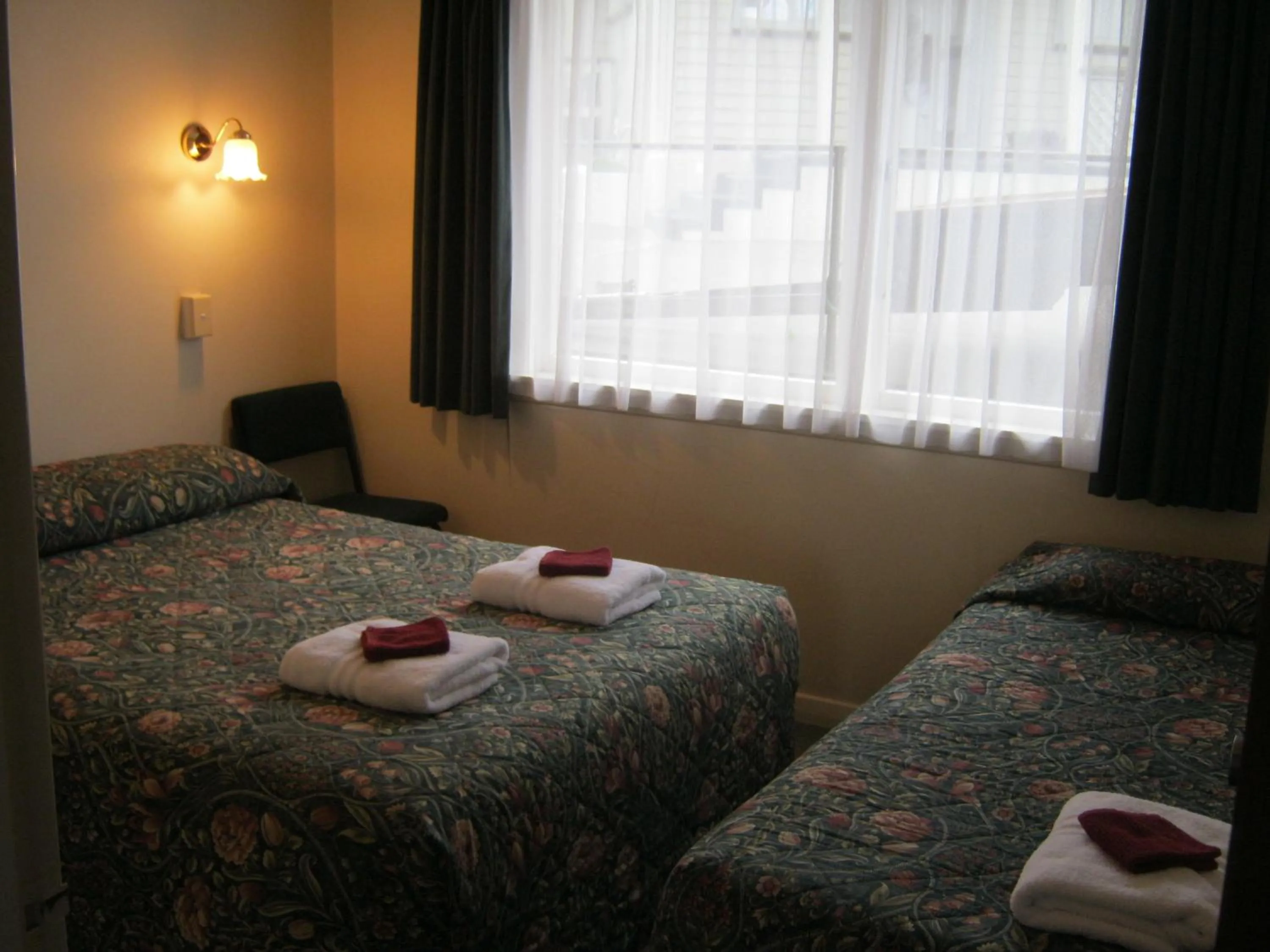 Bed in Blue Dolphin Motel