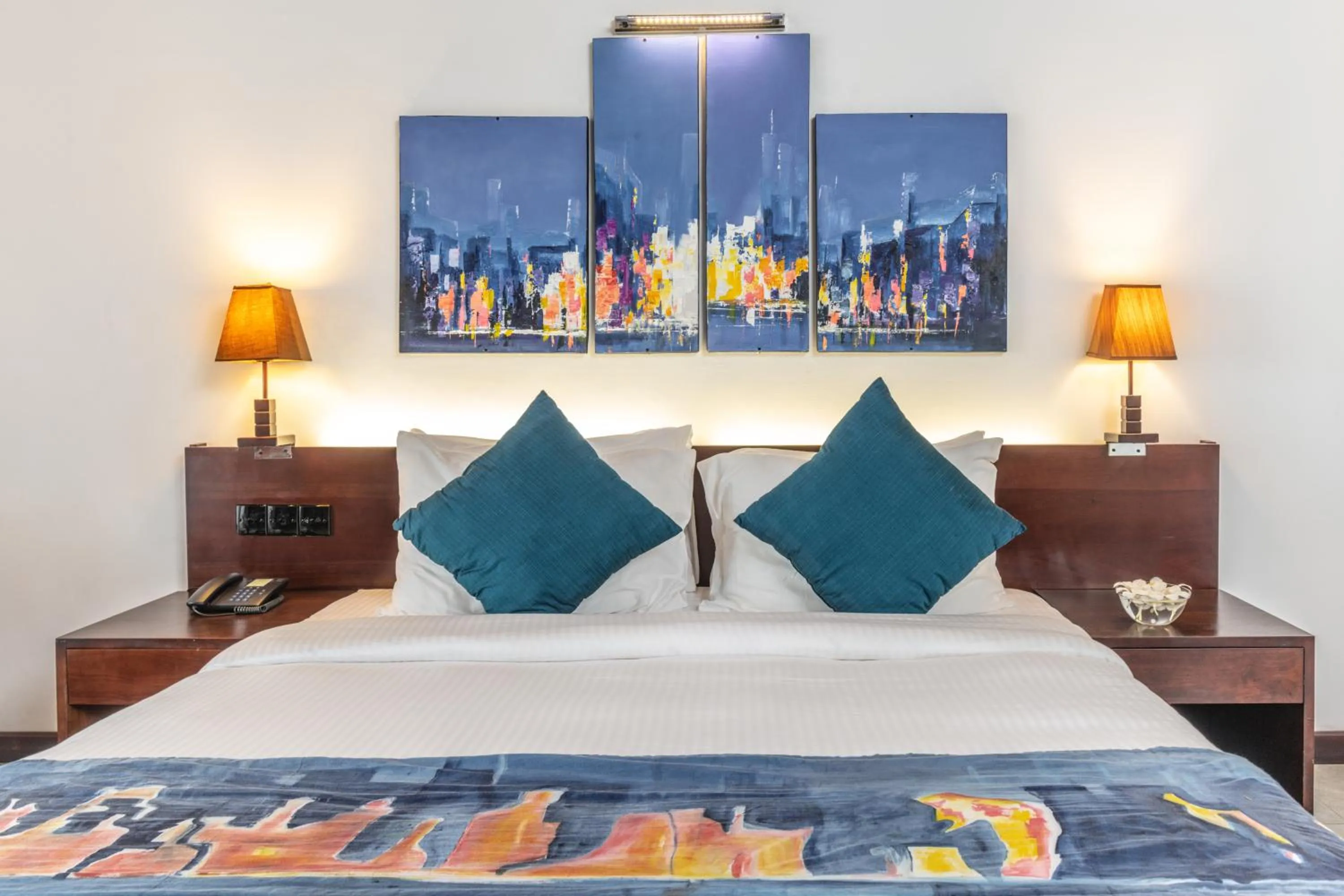 Bed in Amethyst Resort Passikudah