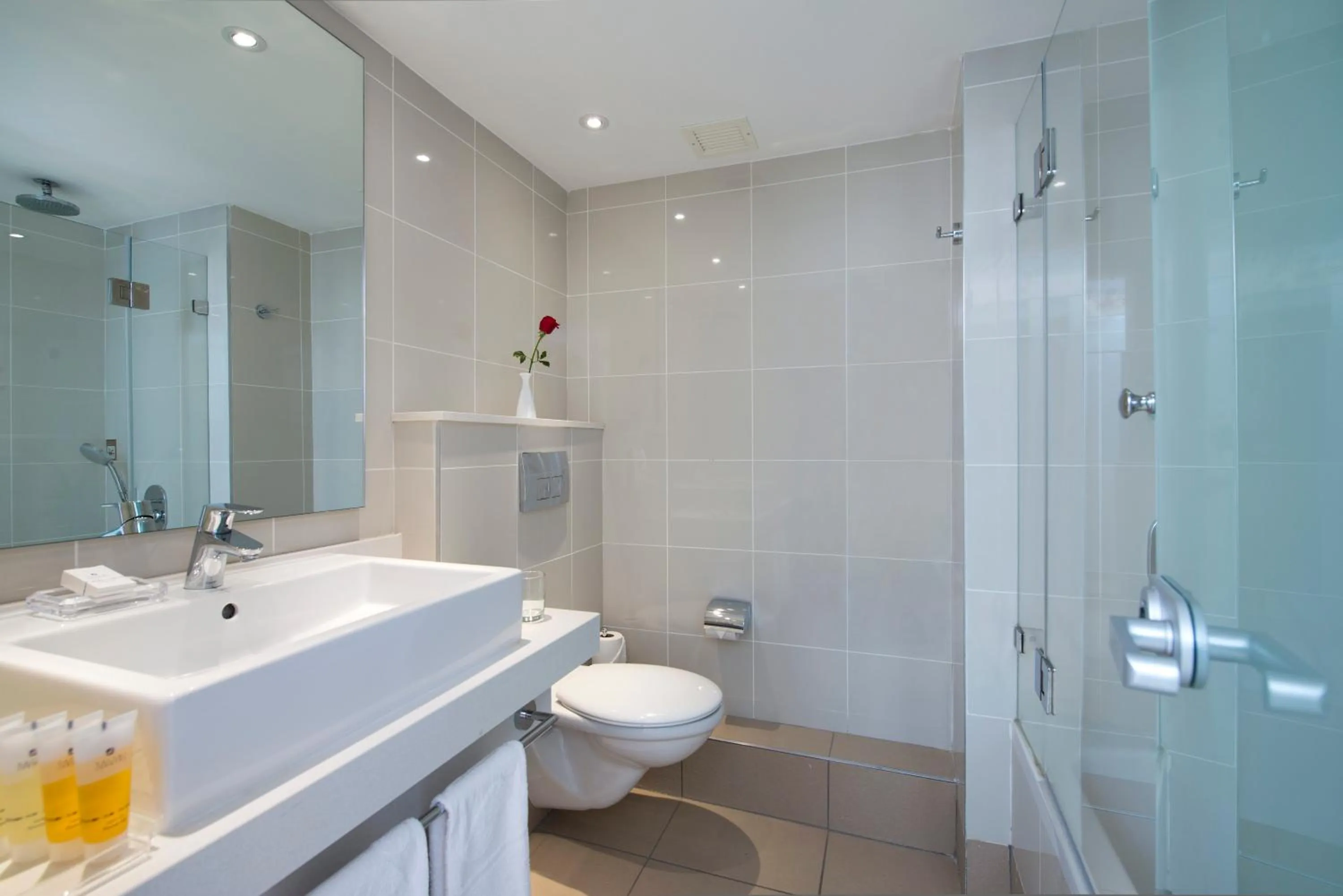 Bathroom in Lagoona by Isrotel Collection