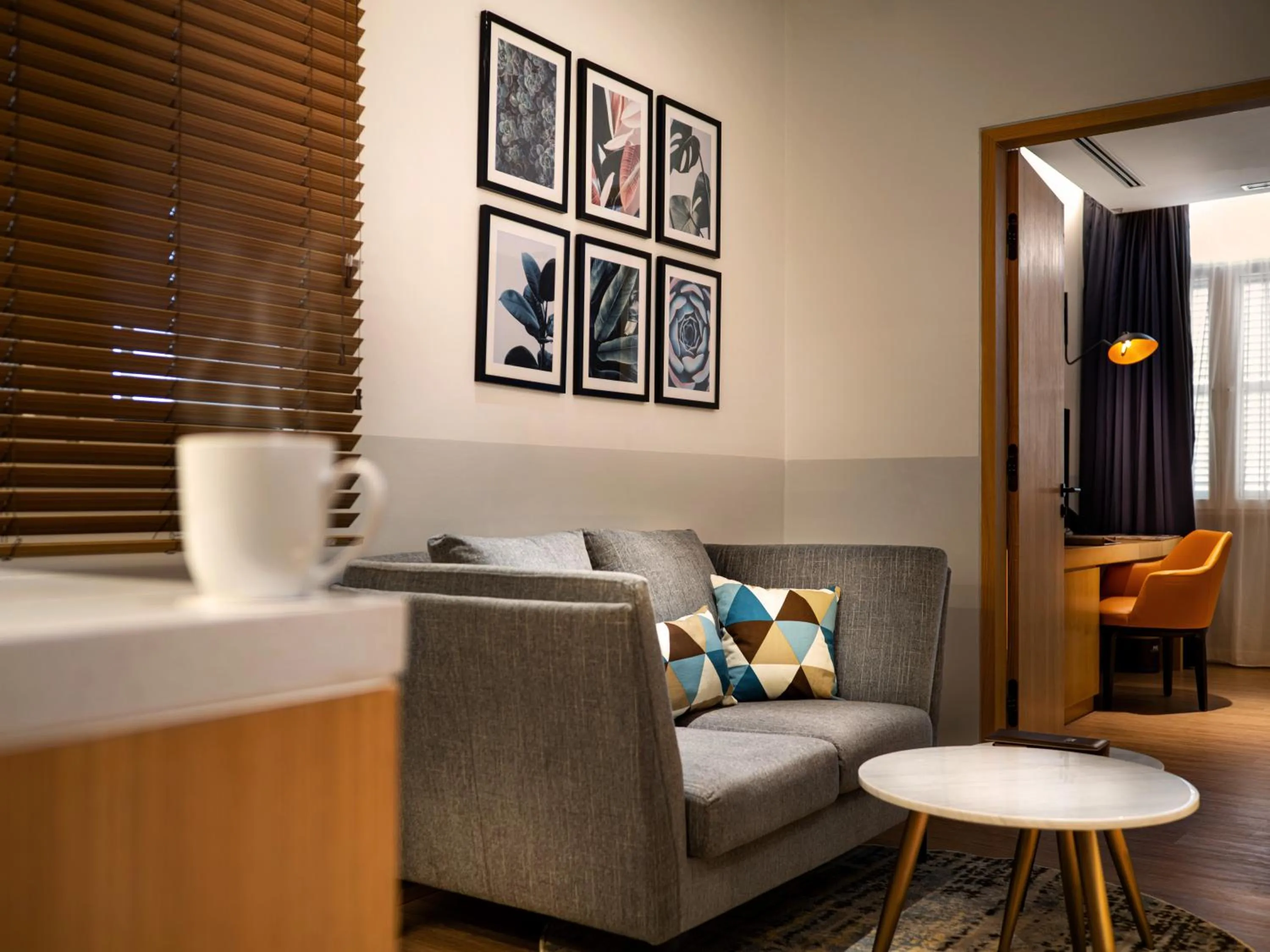 Living room in Macalister Hotel Managed by The Ascott Limited