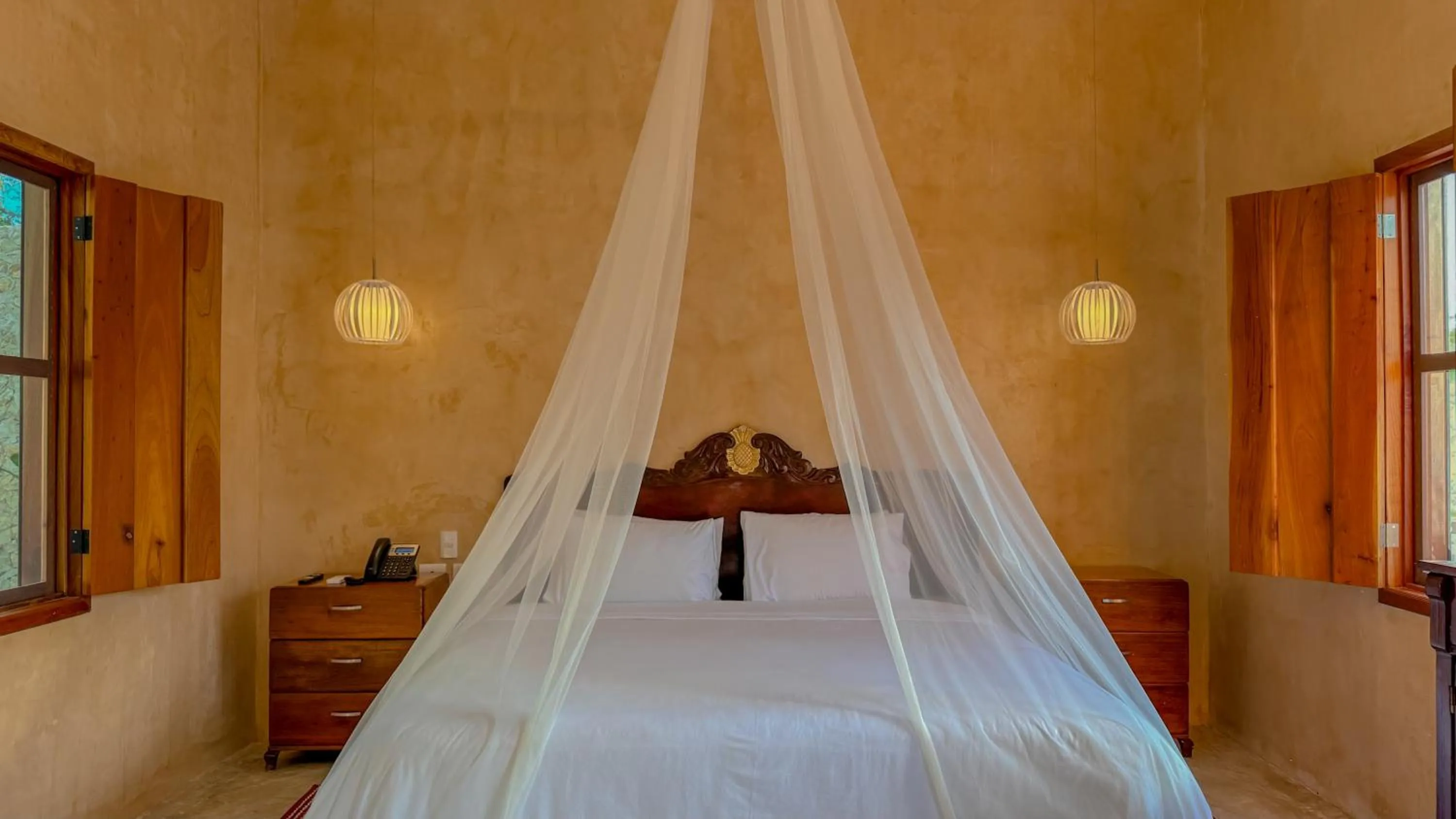 Bed in Hacienda Cenote San Ignacio