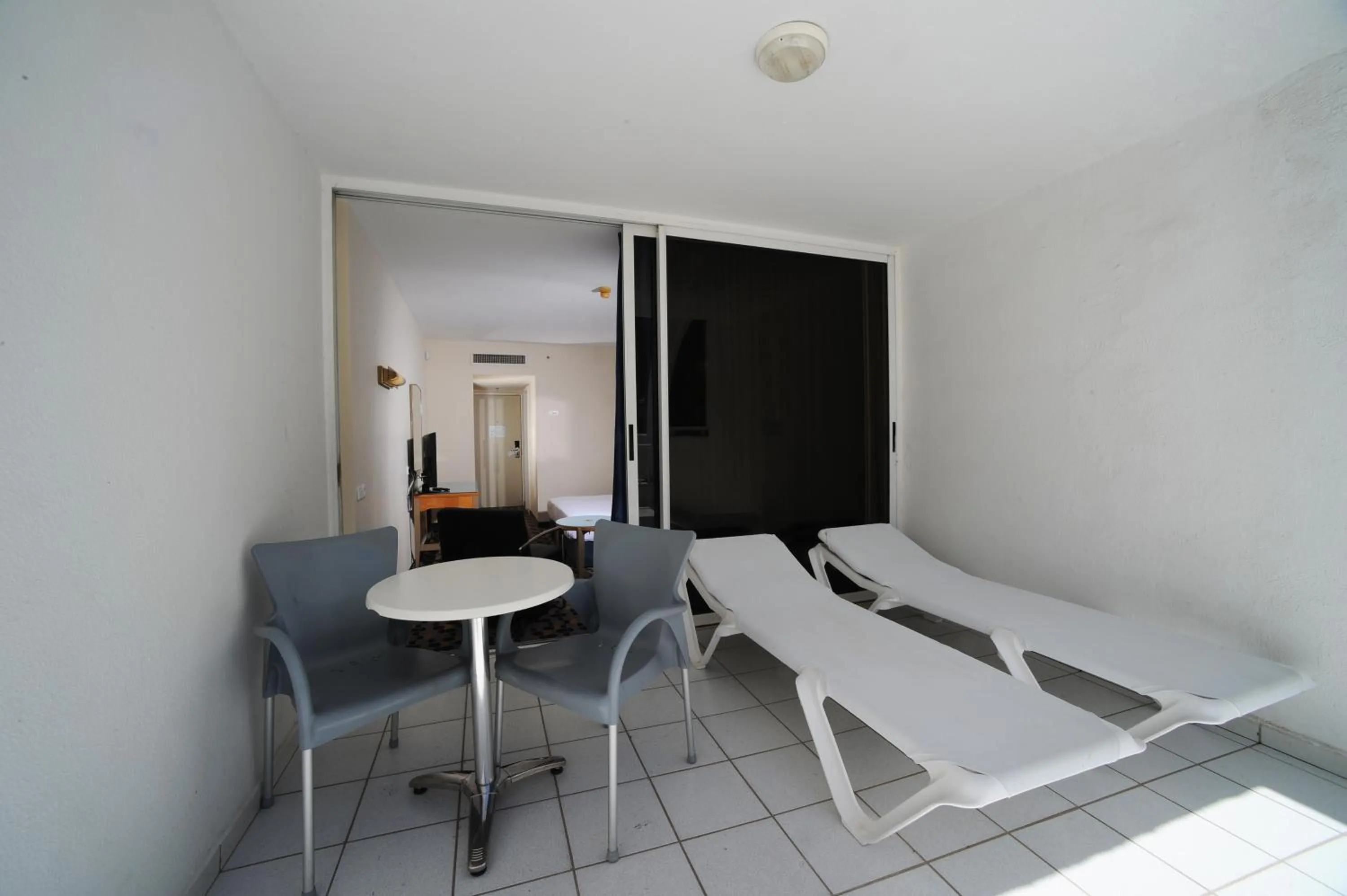 Seating area in Sport Club by Isrotel Collection