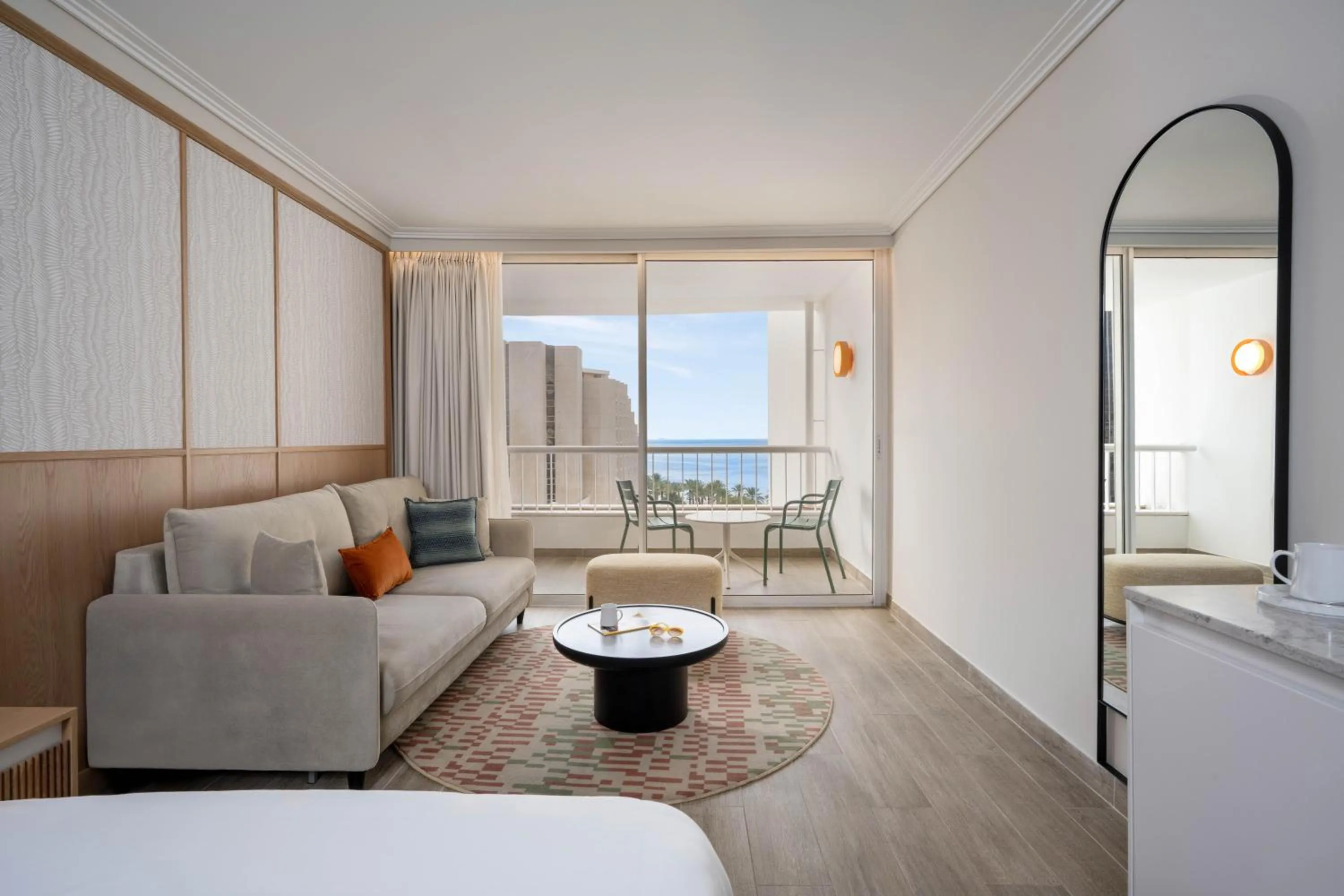 Living room, Bed in Sport Club by Isrotel Collection