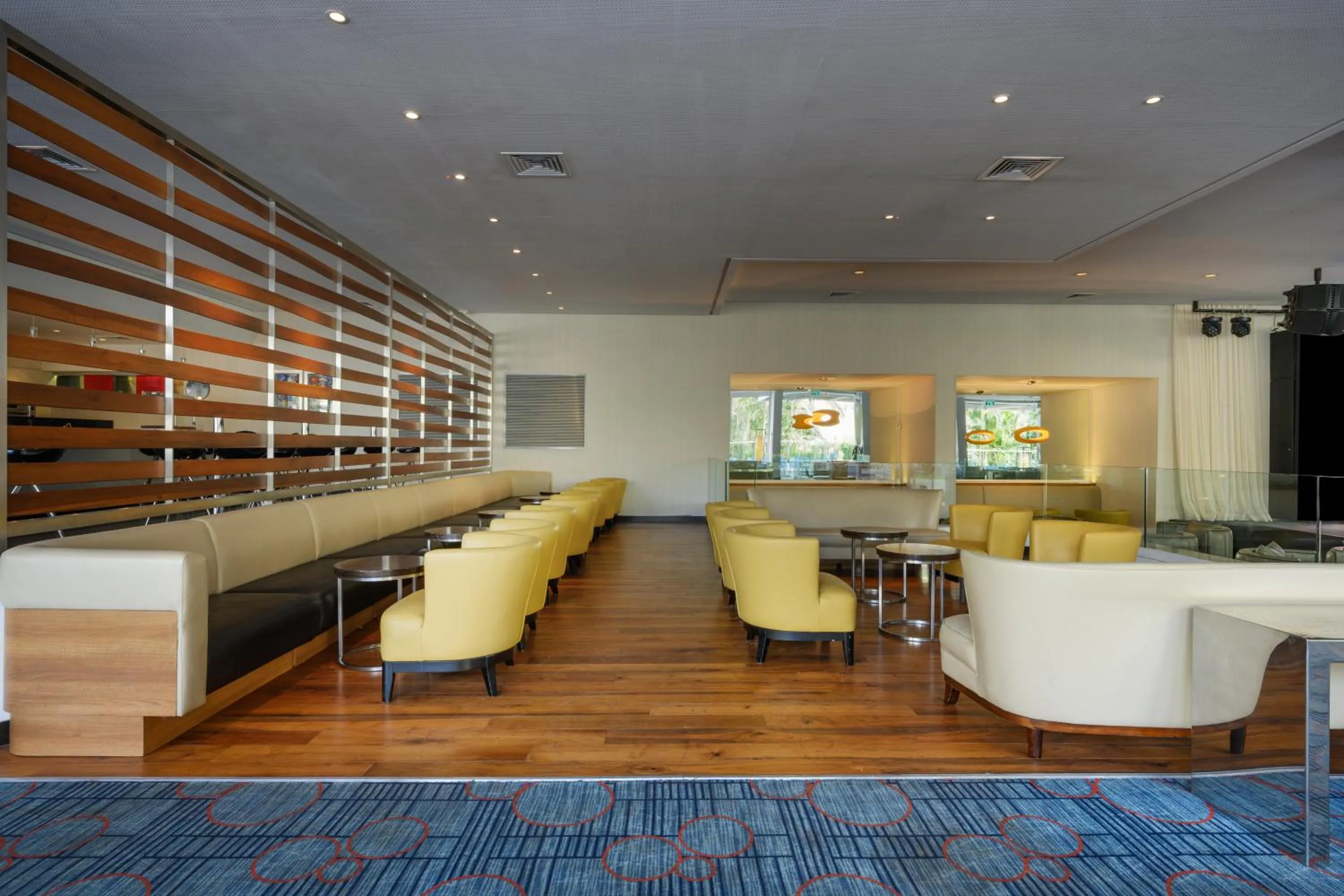 Seating area in Sport Club by Isrotel Collection