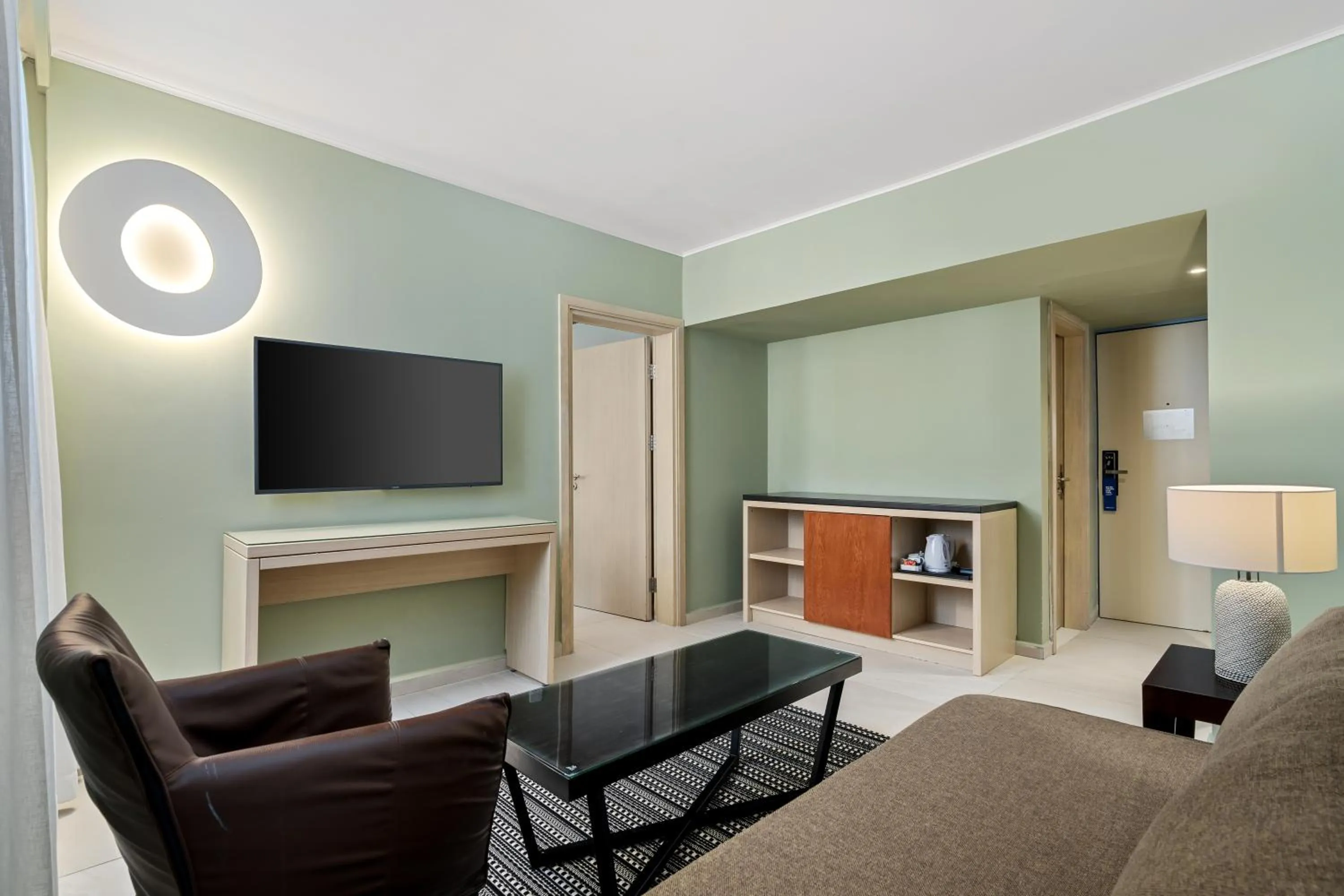 Living room in Sport Club by Isrotel Collection