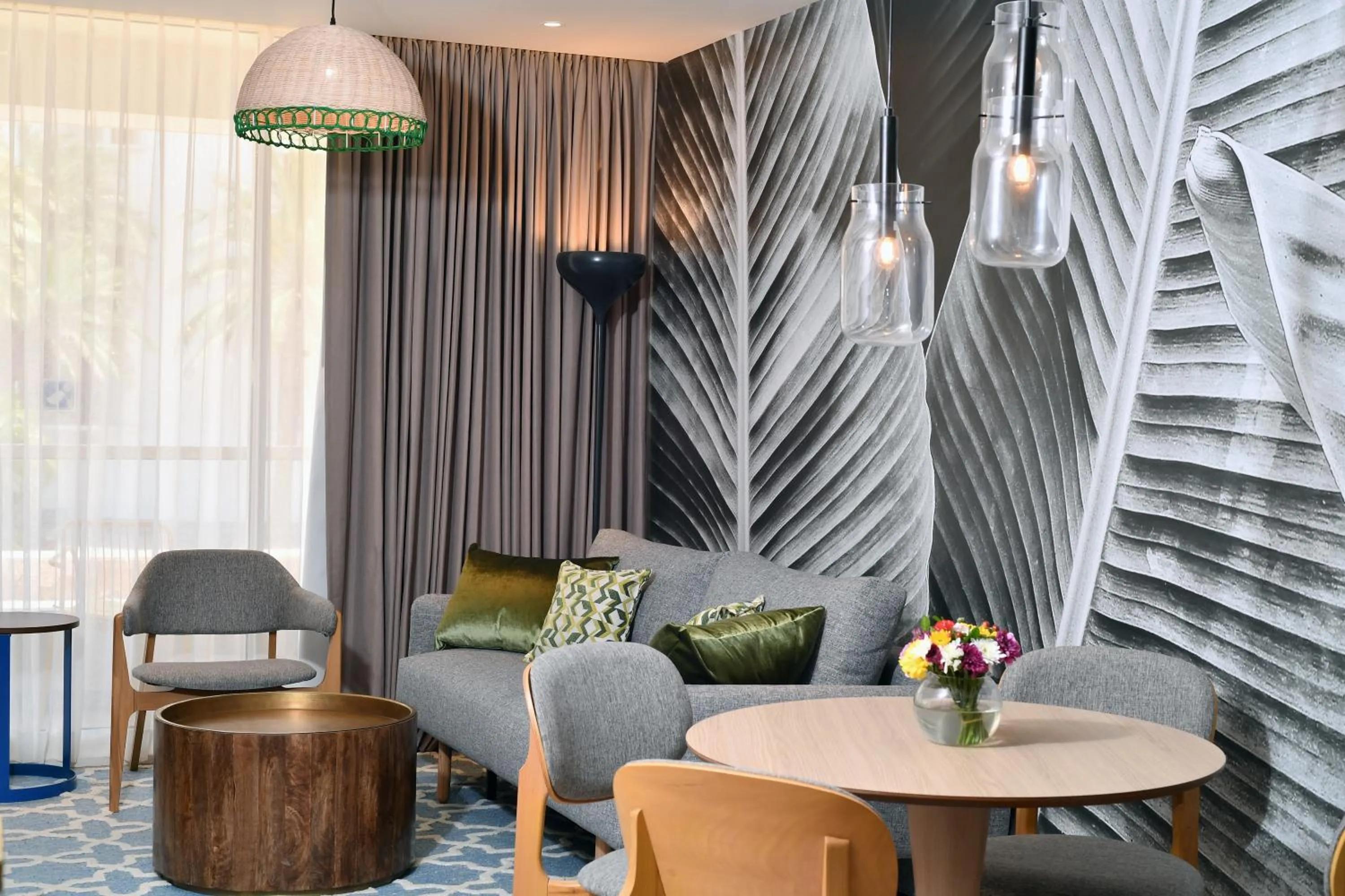 Living room in Royal Garden by Isrotel Collection