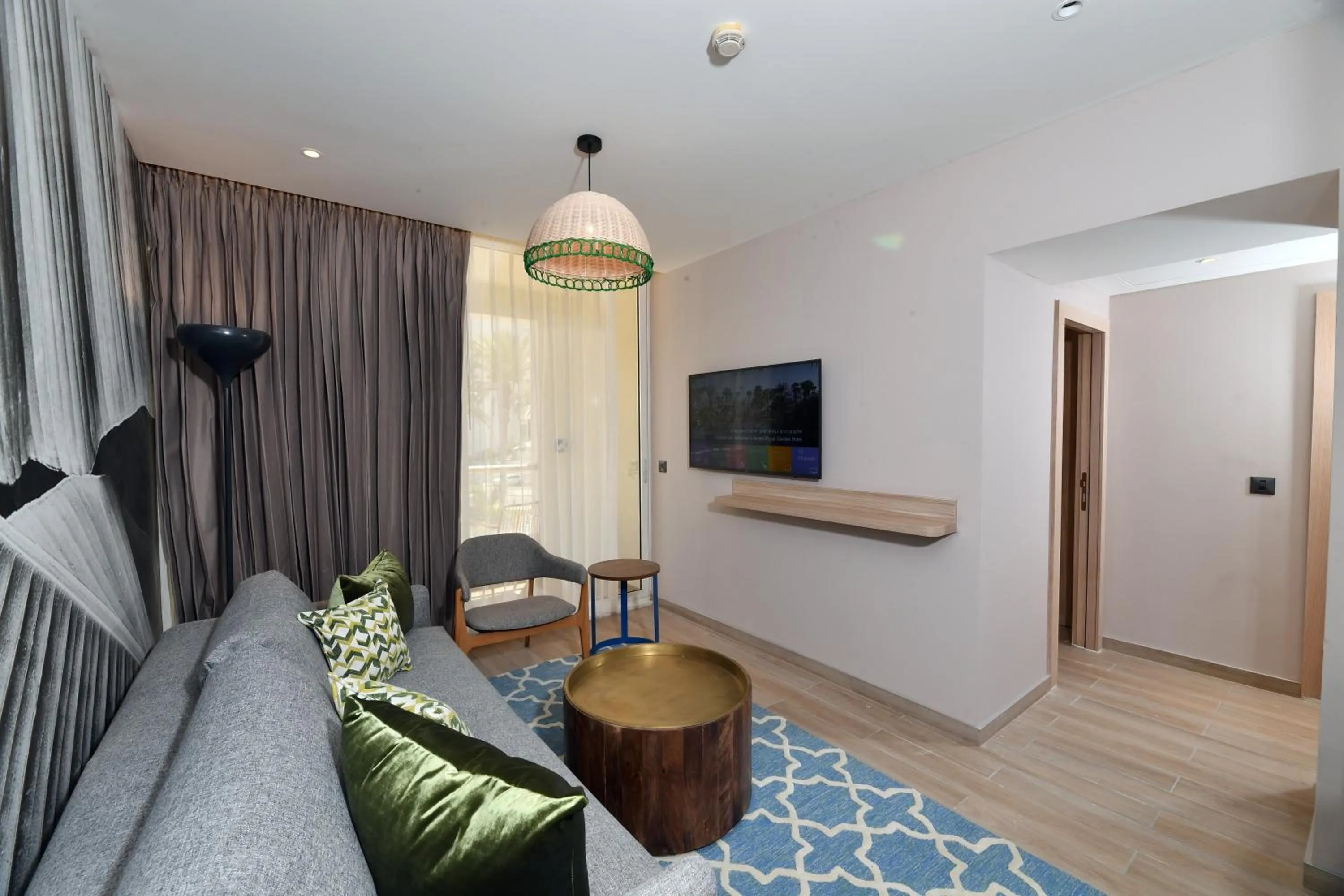 Living room in Royal Garden by Isrotel Collection