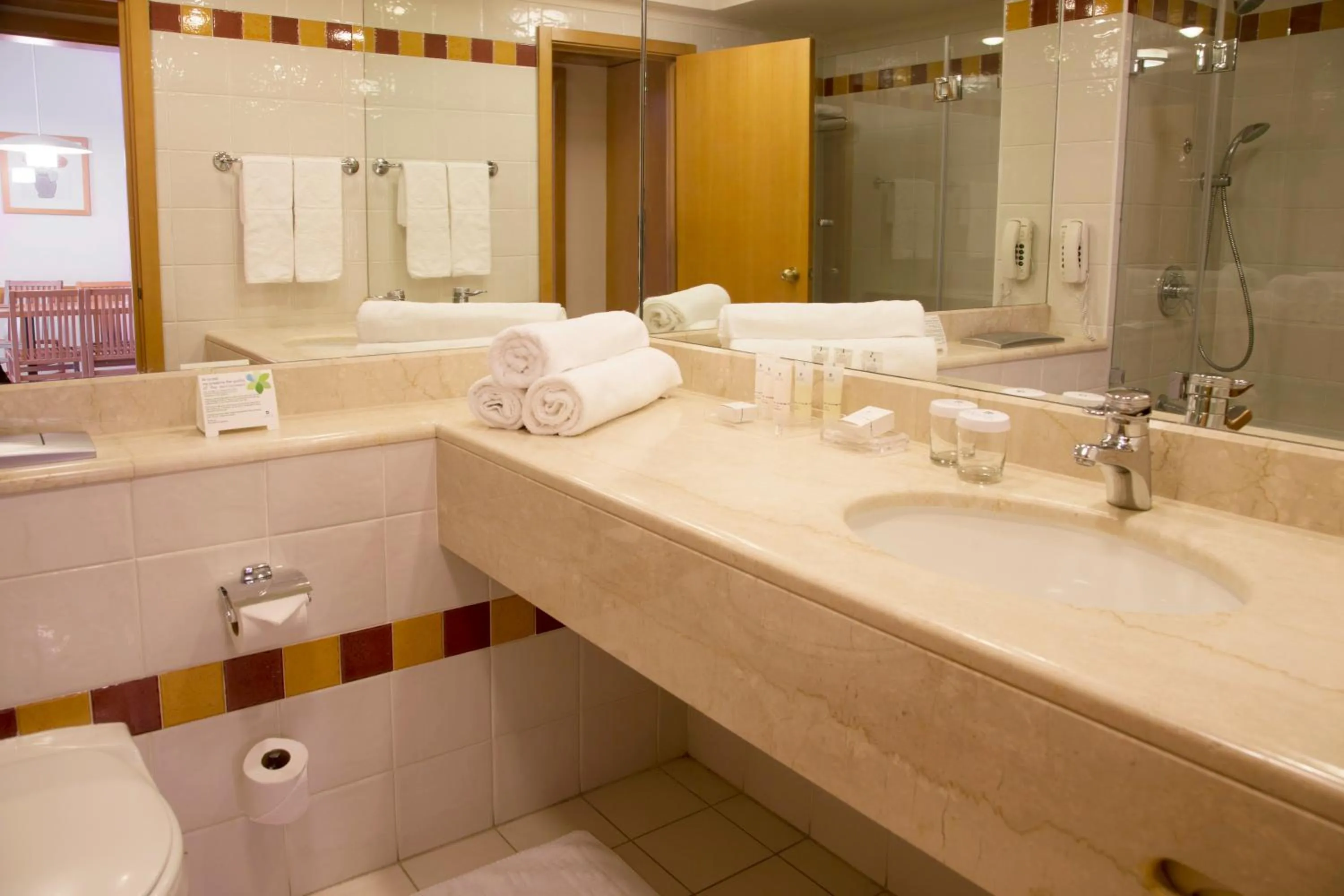 Bathroom in Royal Garden by Isrotel Collection