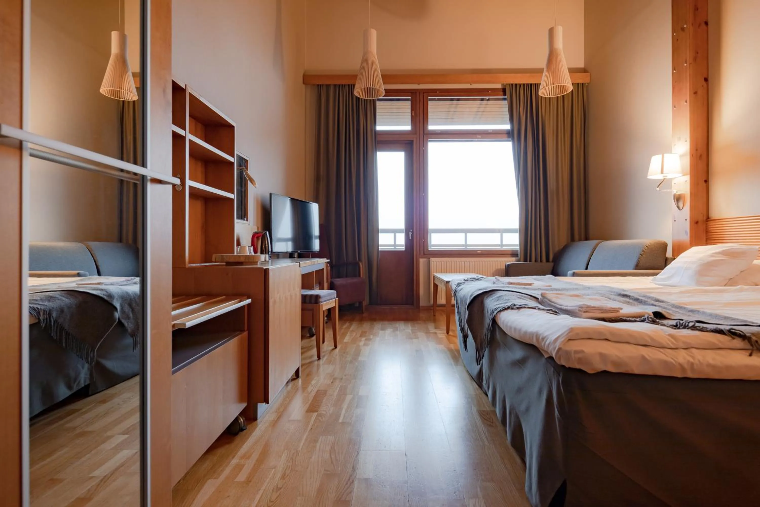 Bed in Lapland Hotels Saaga