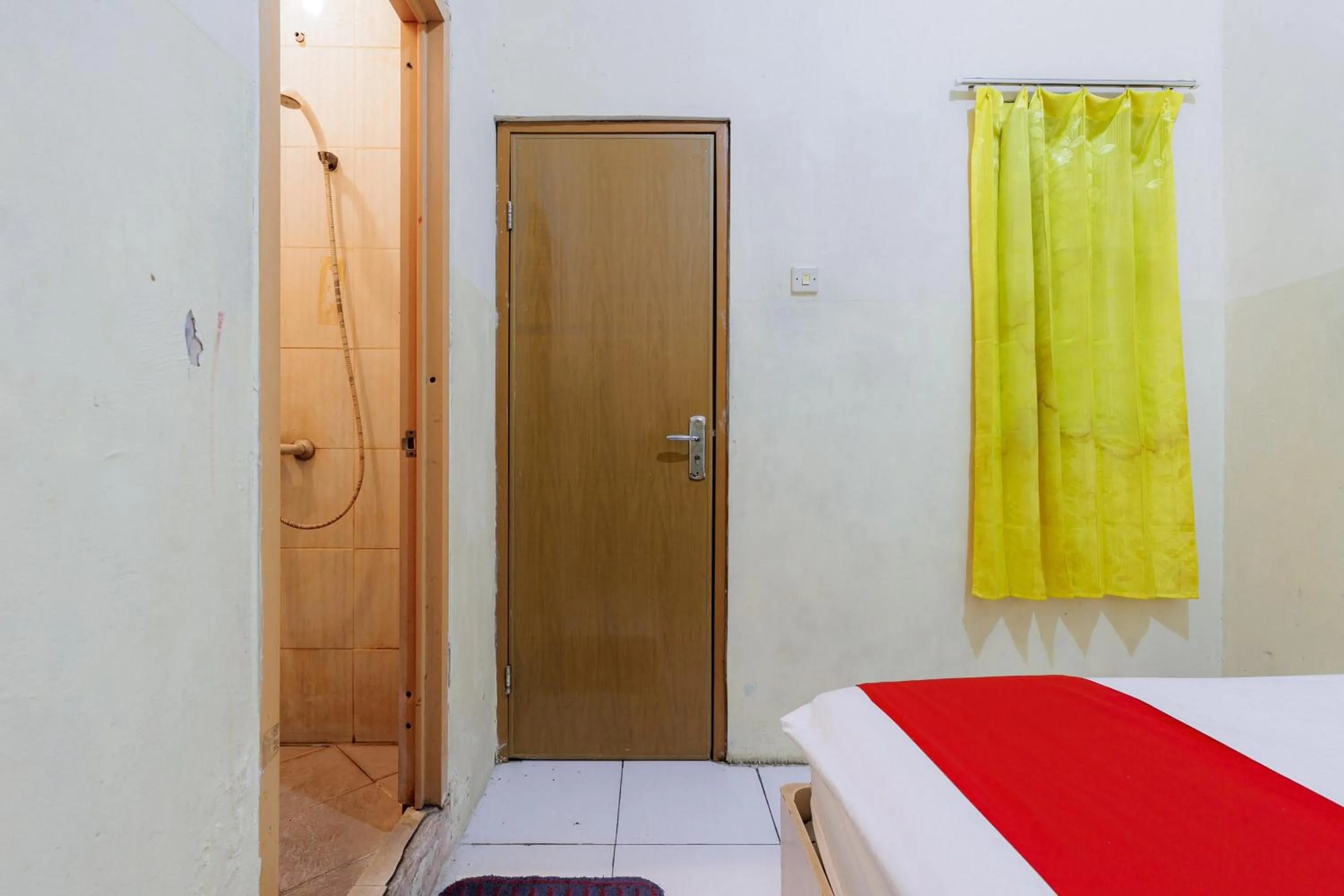 Bedroom in RedDoorz near Esa Unggul University Jakarta Campus