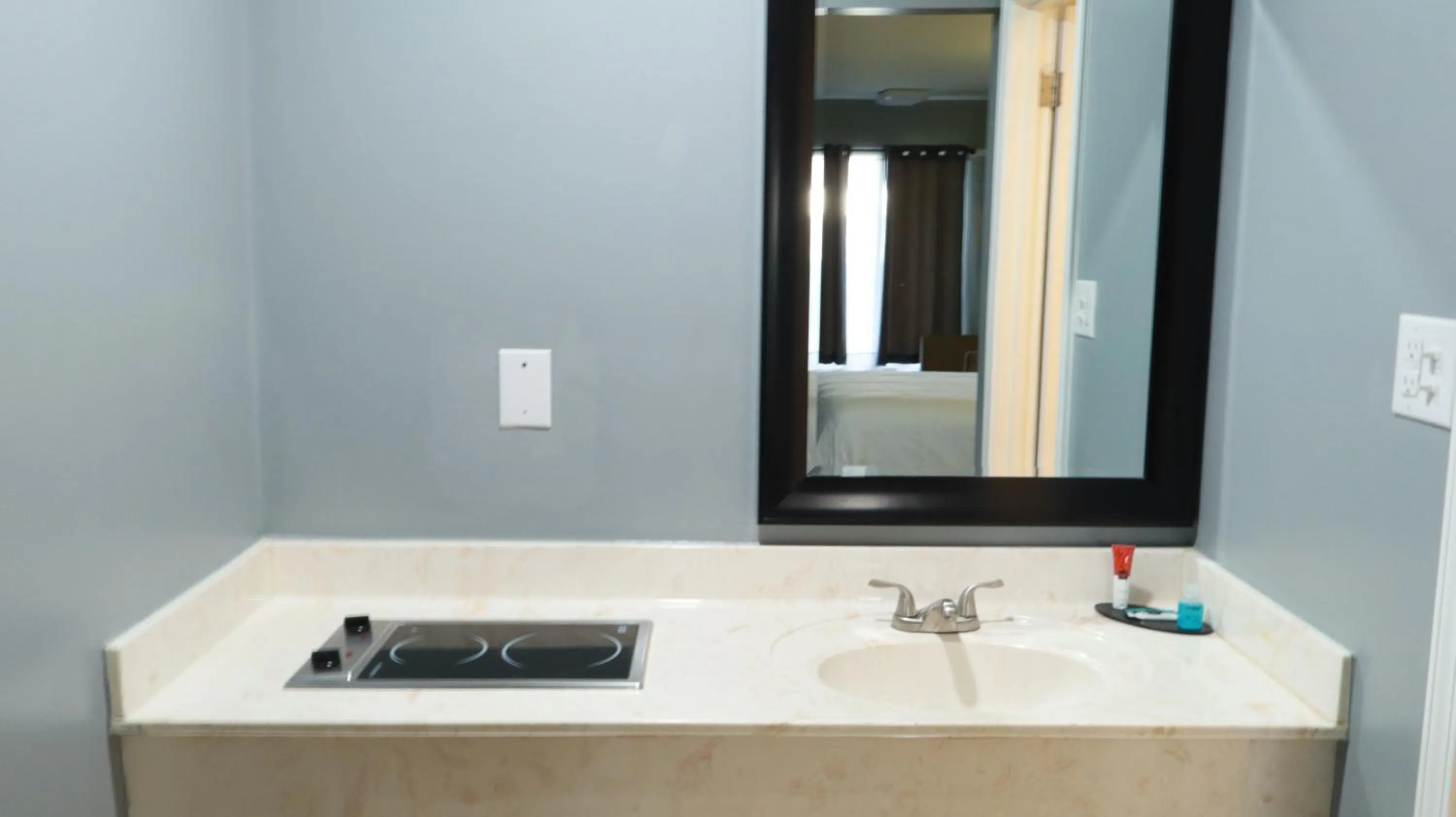 Bathroom in Americas Best Value Inn and Suites Blytheville by Sonesta