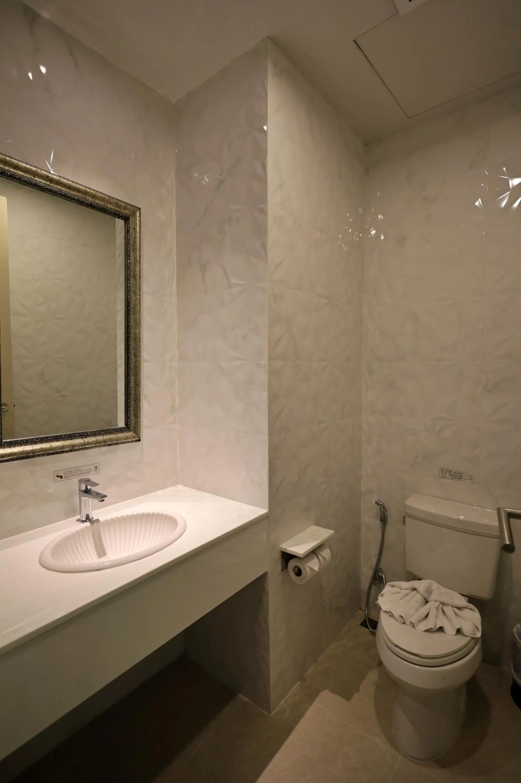 Toilet in The Waters Khao Lak by Katathani - SHA Extra Plus