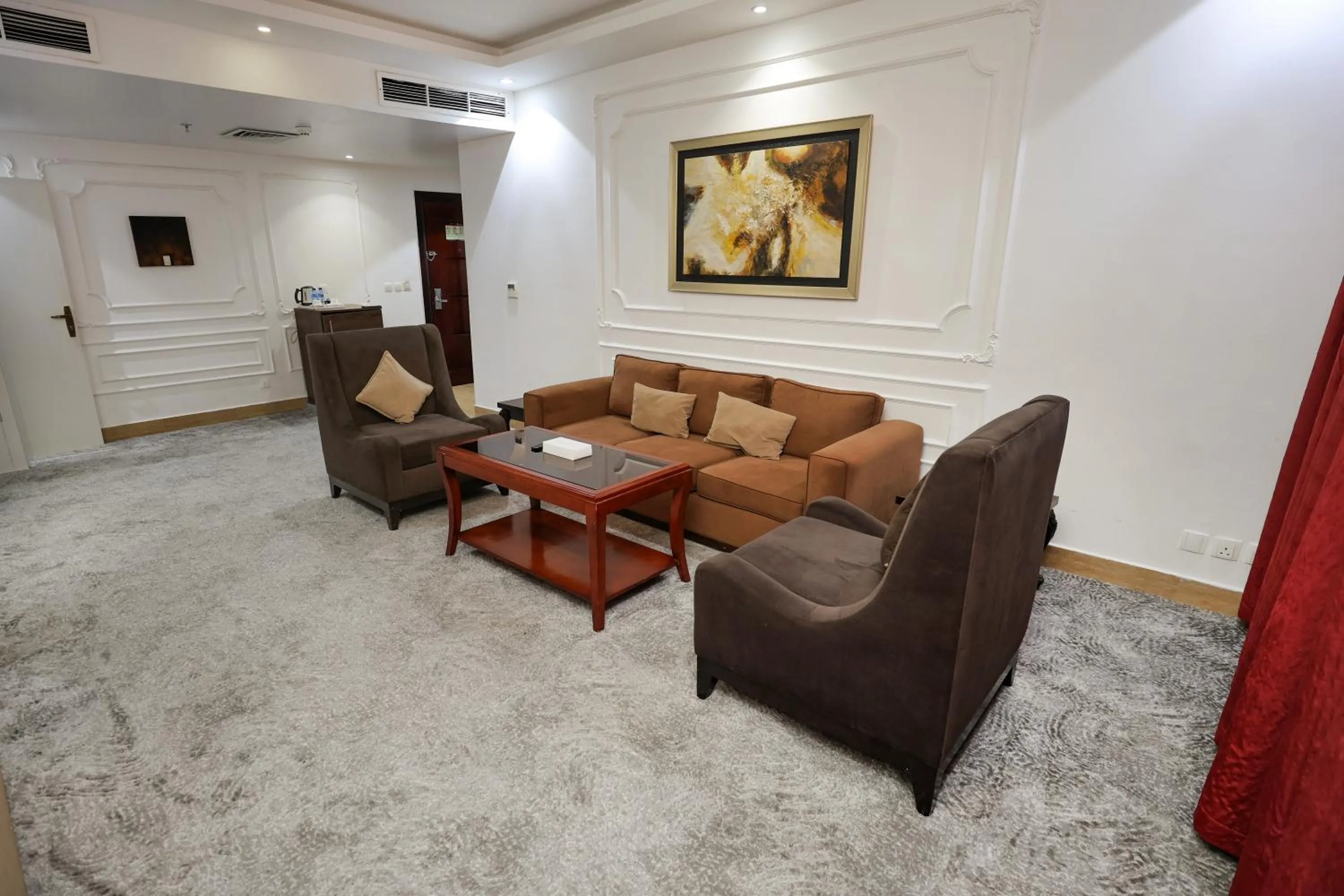 Living room in Reef Global Hotel