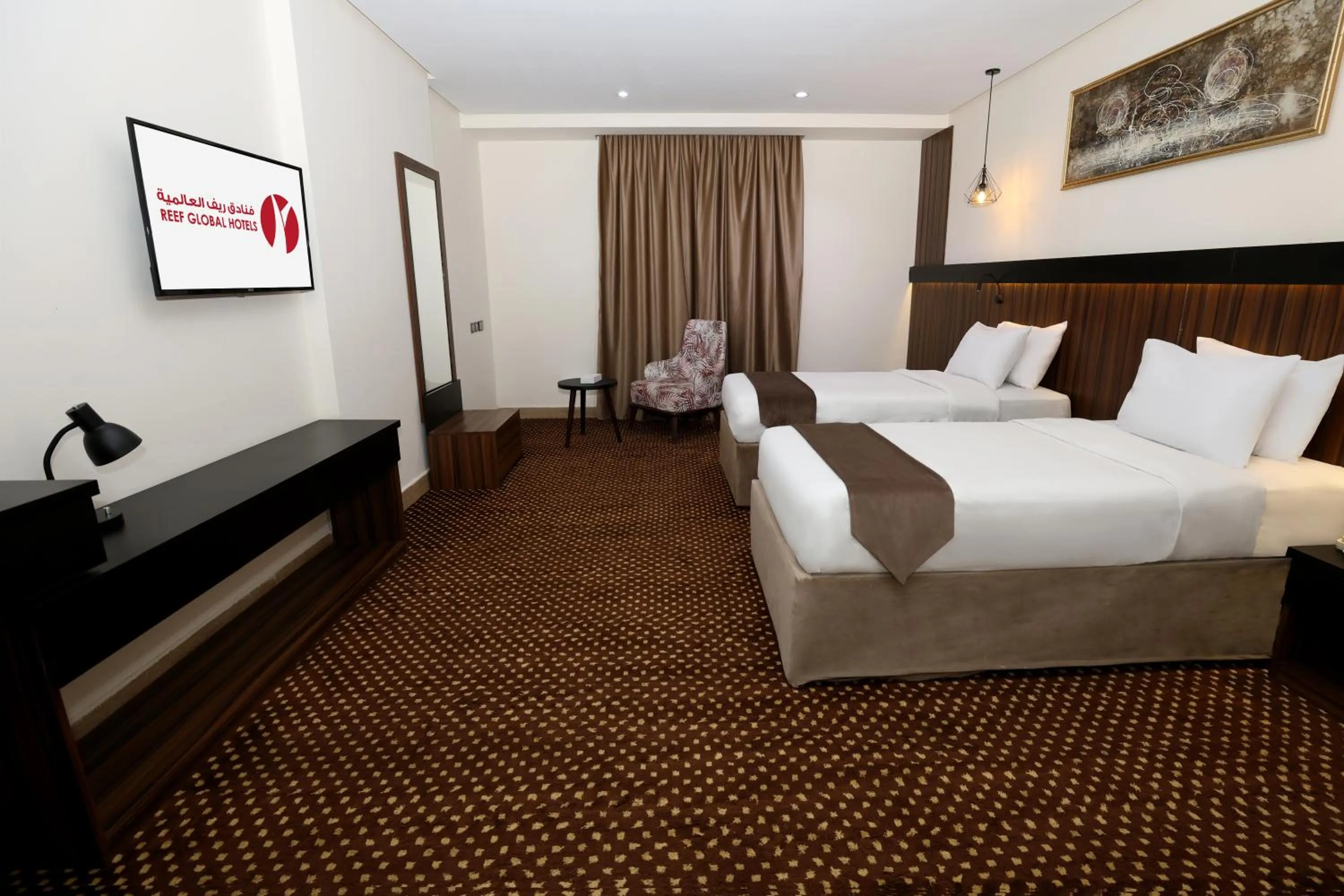 Bed in Reef Global Hotel