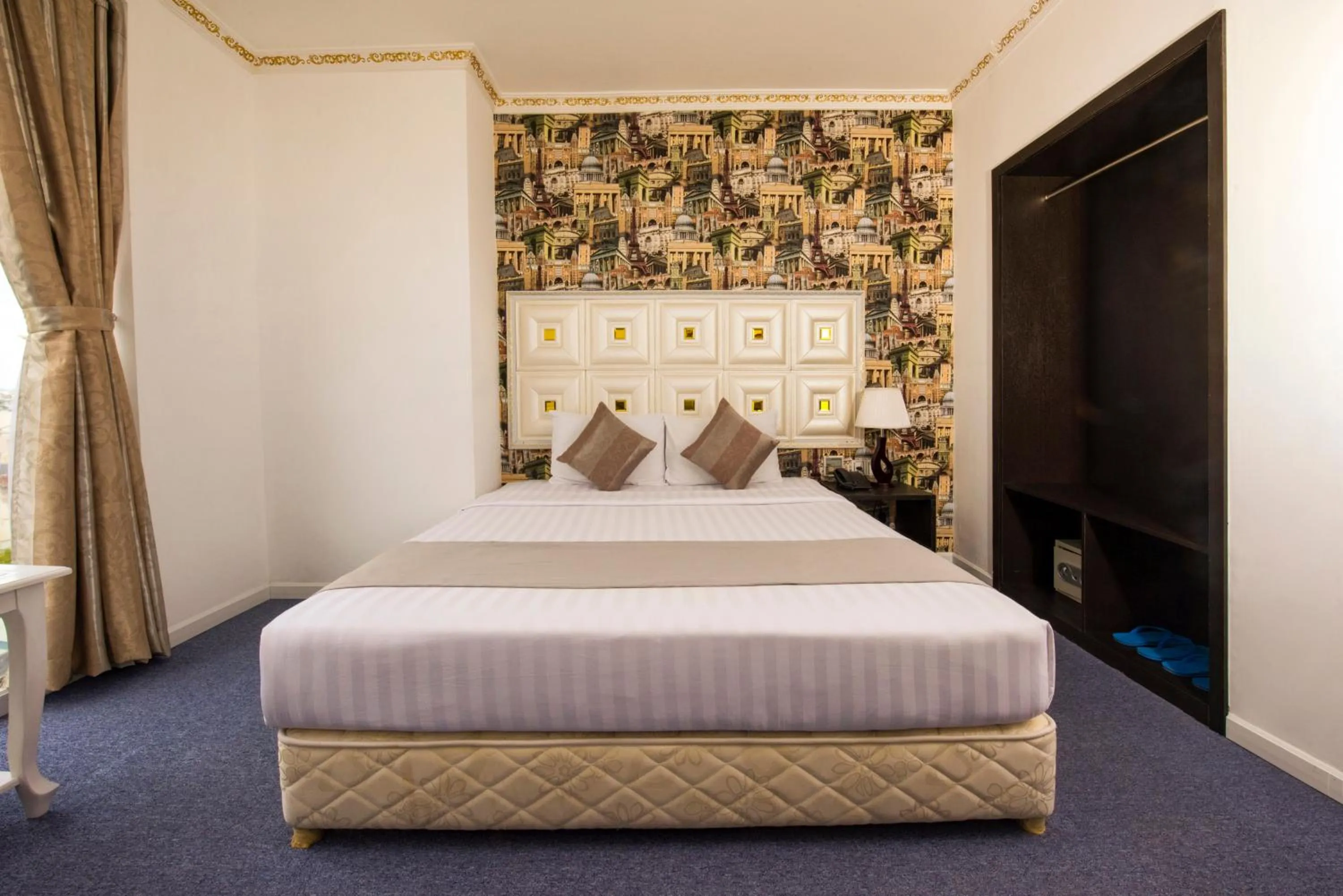 Bed in Golden Crown Hotel