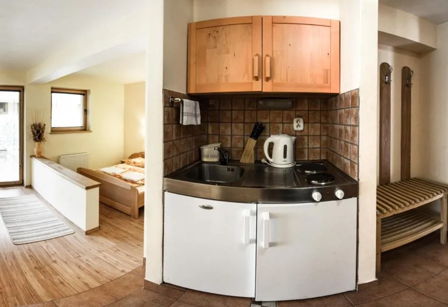 Kitchen or kitchenette, Bed in Penzión Jozef a apartmány