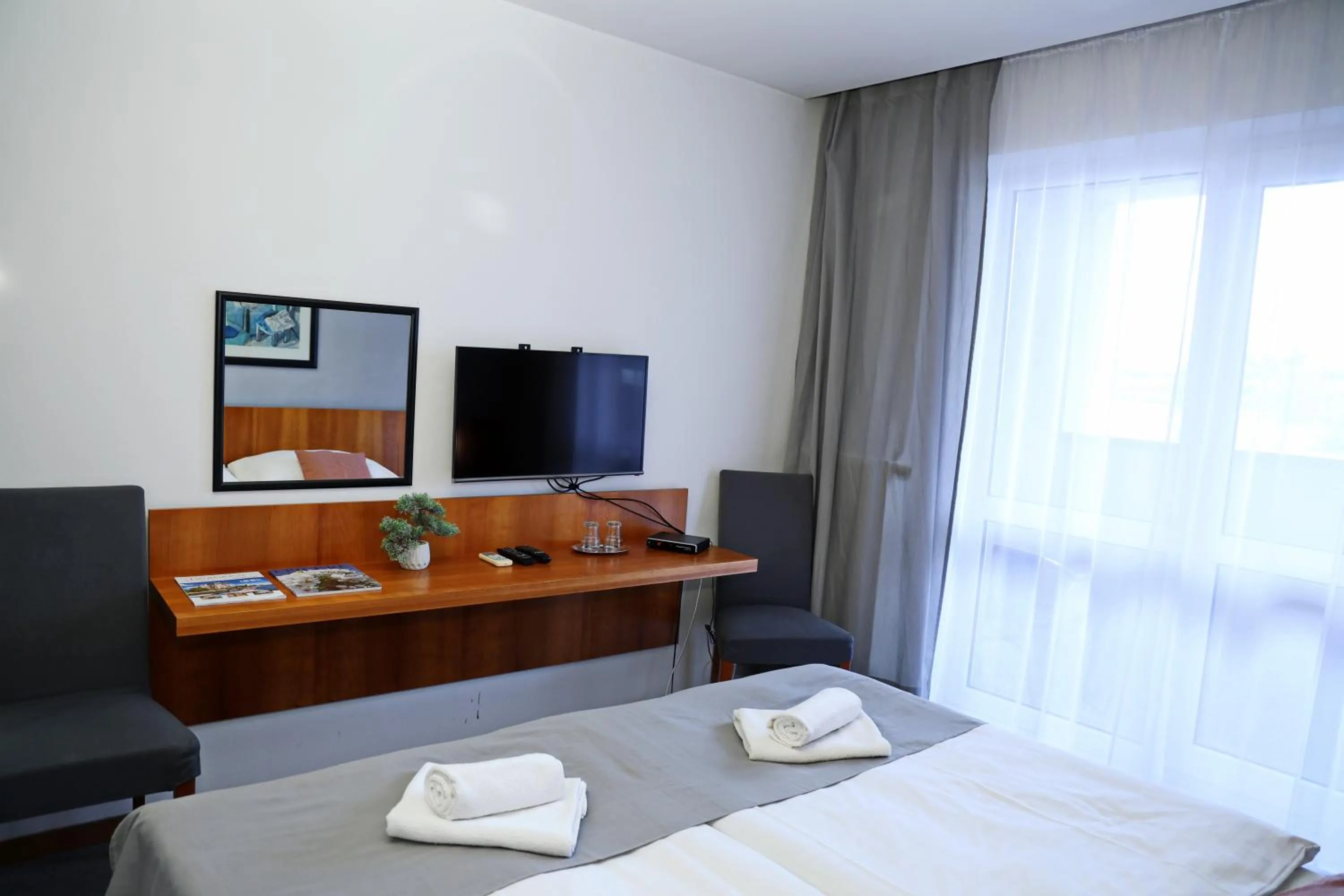 TV and multimedia, Bed in Hotel Maxim