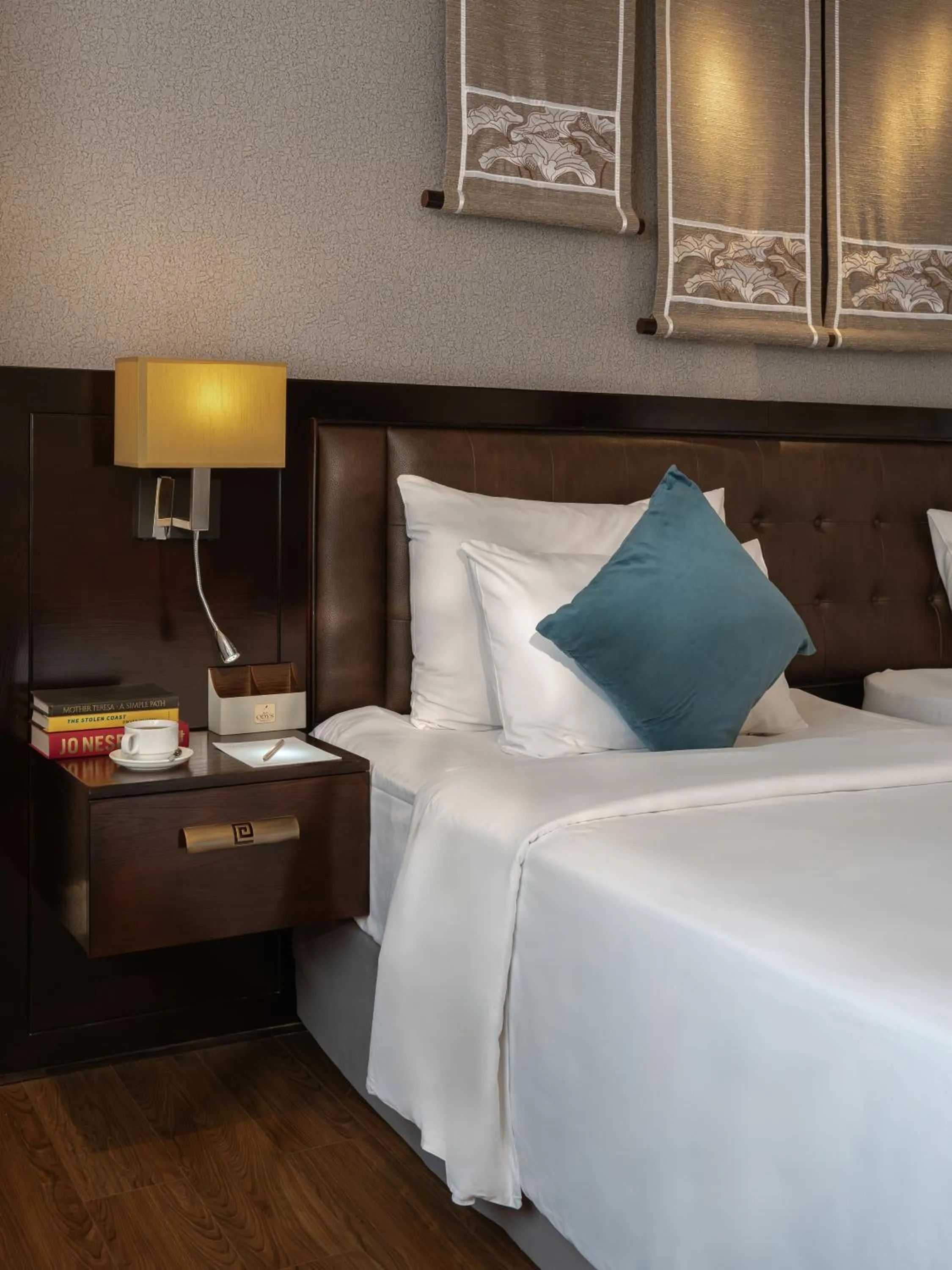 Bed in The Odys Boutique Hotel