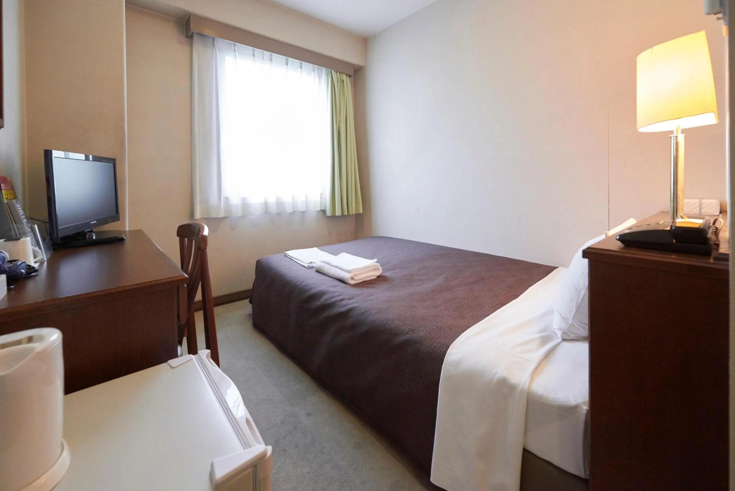 Photo of the whole room, Bed in Select Inn Mishima