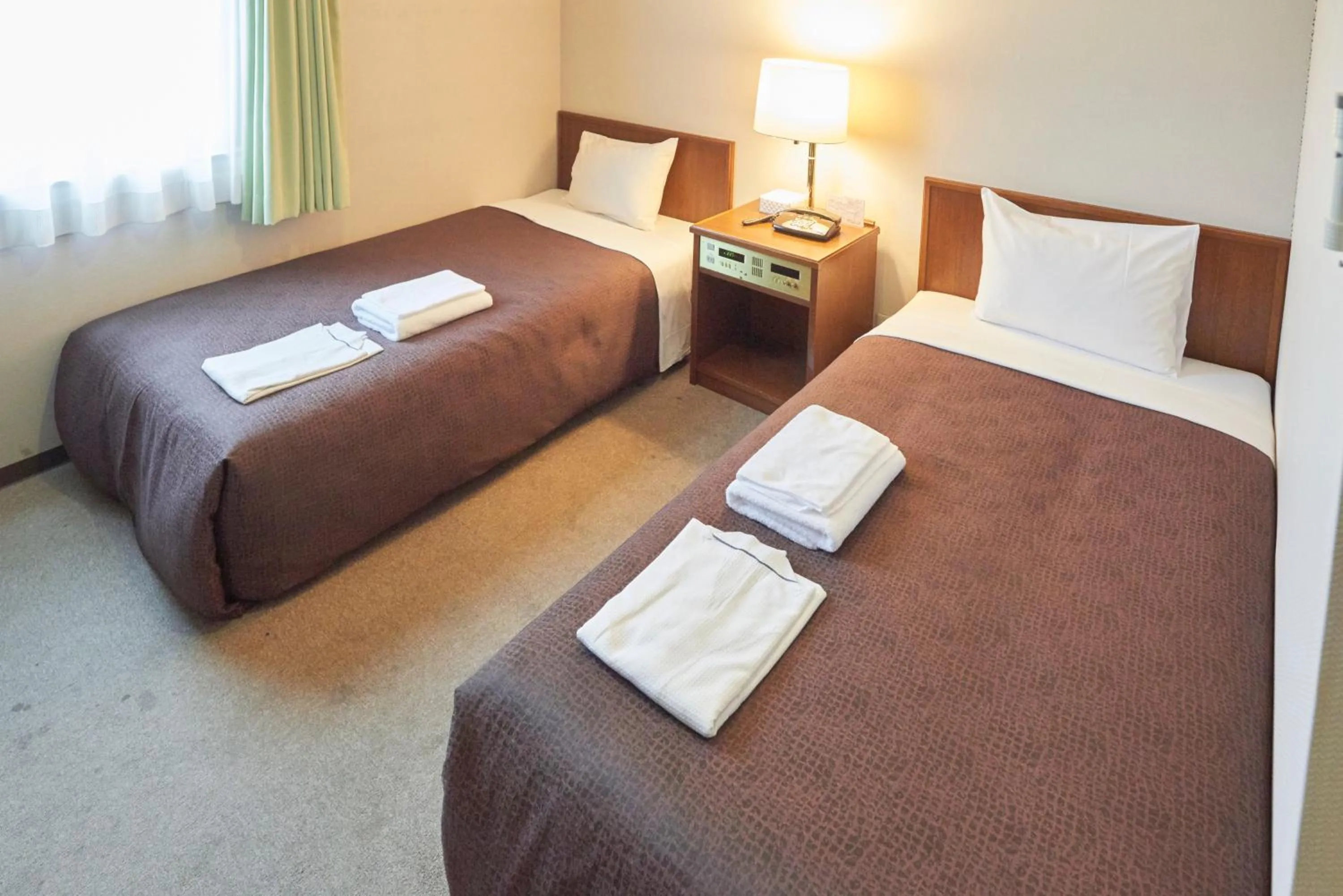 Photo of the whole room, Bed in Select Inn Mishima