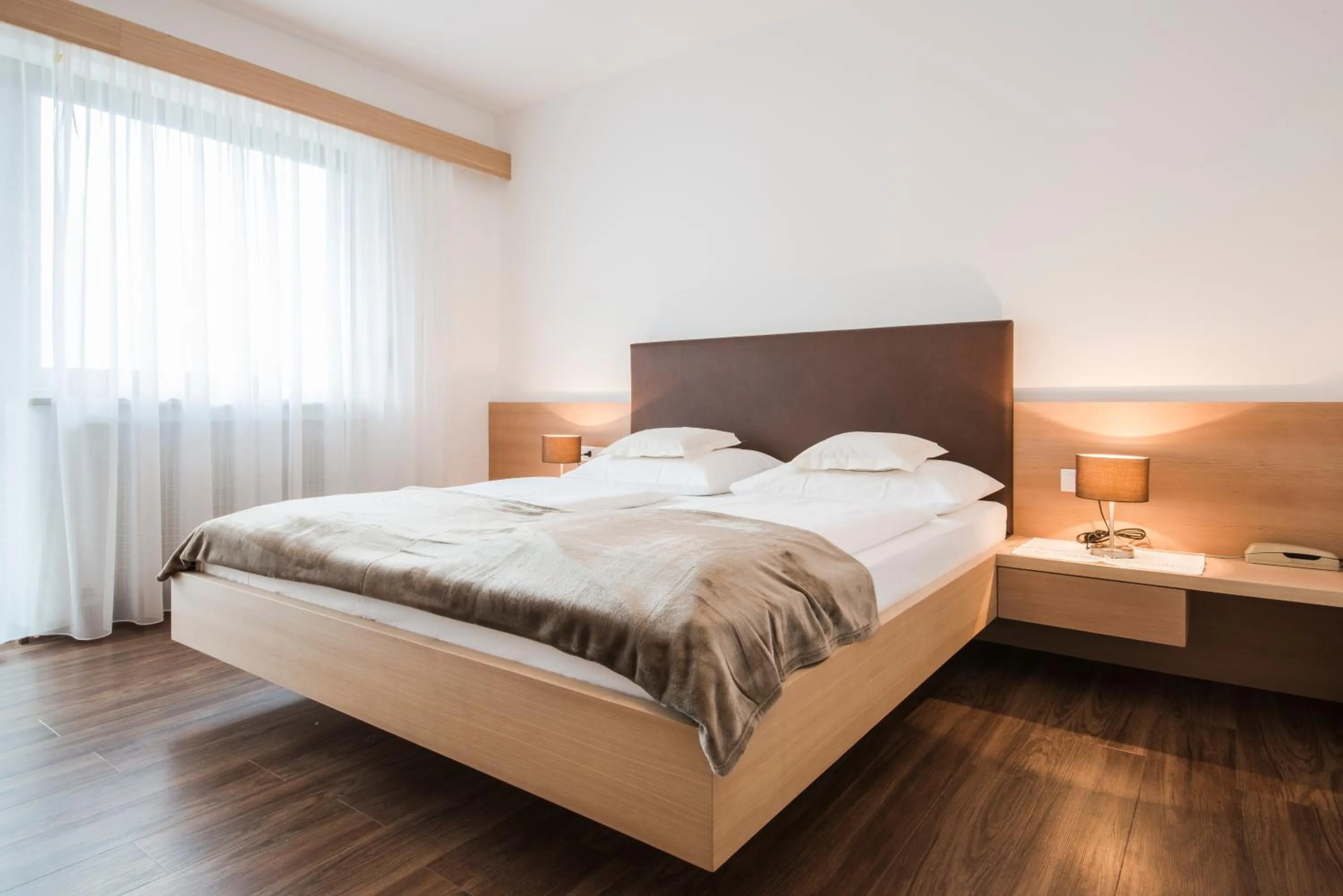 Bed in Amaris Suites