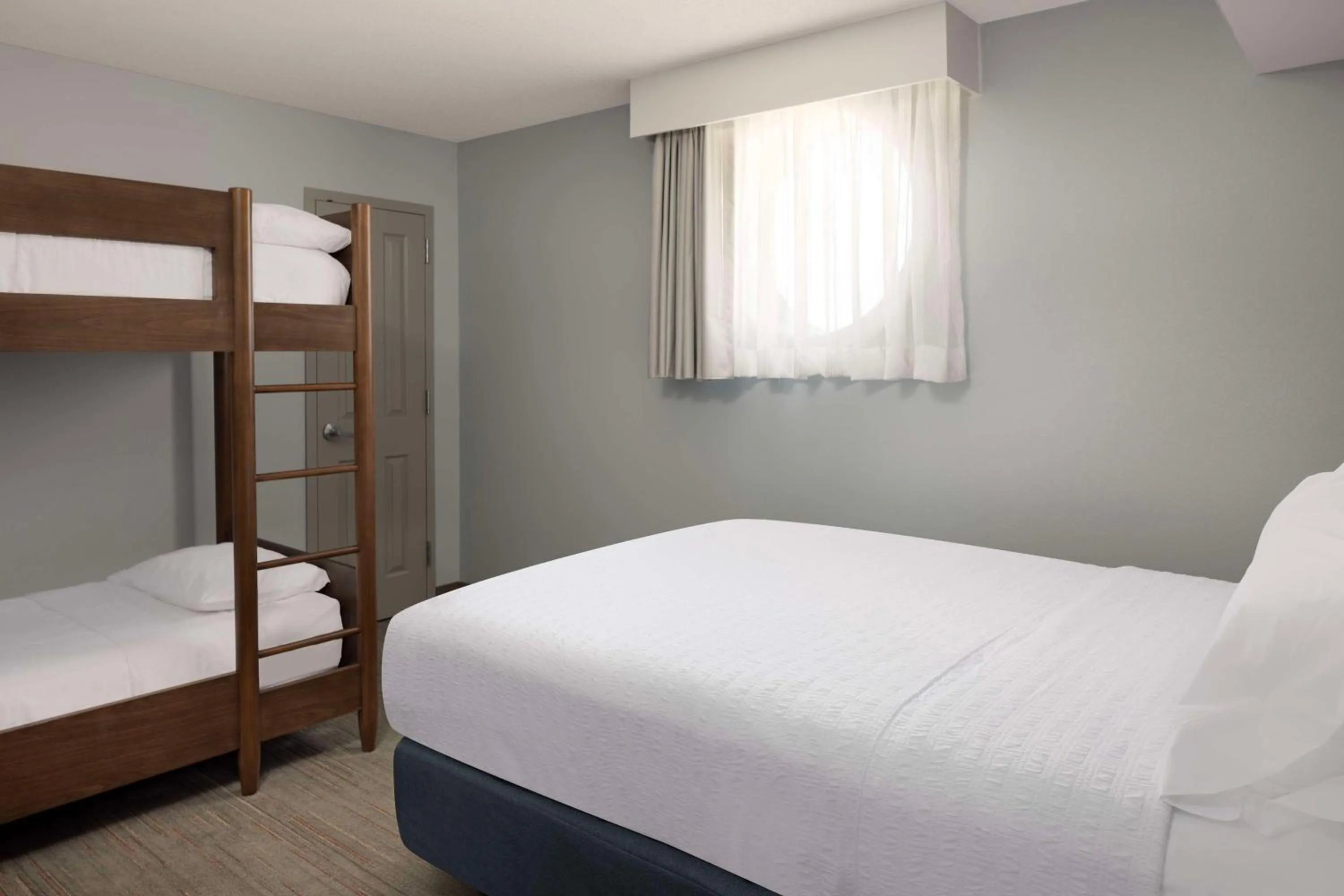 Bed in Hampton Inn & Suites Myrtle Beach Oceanfront