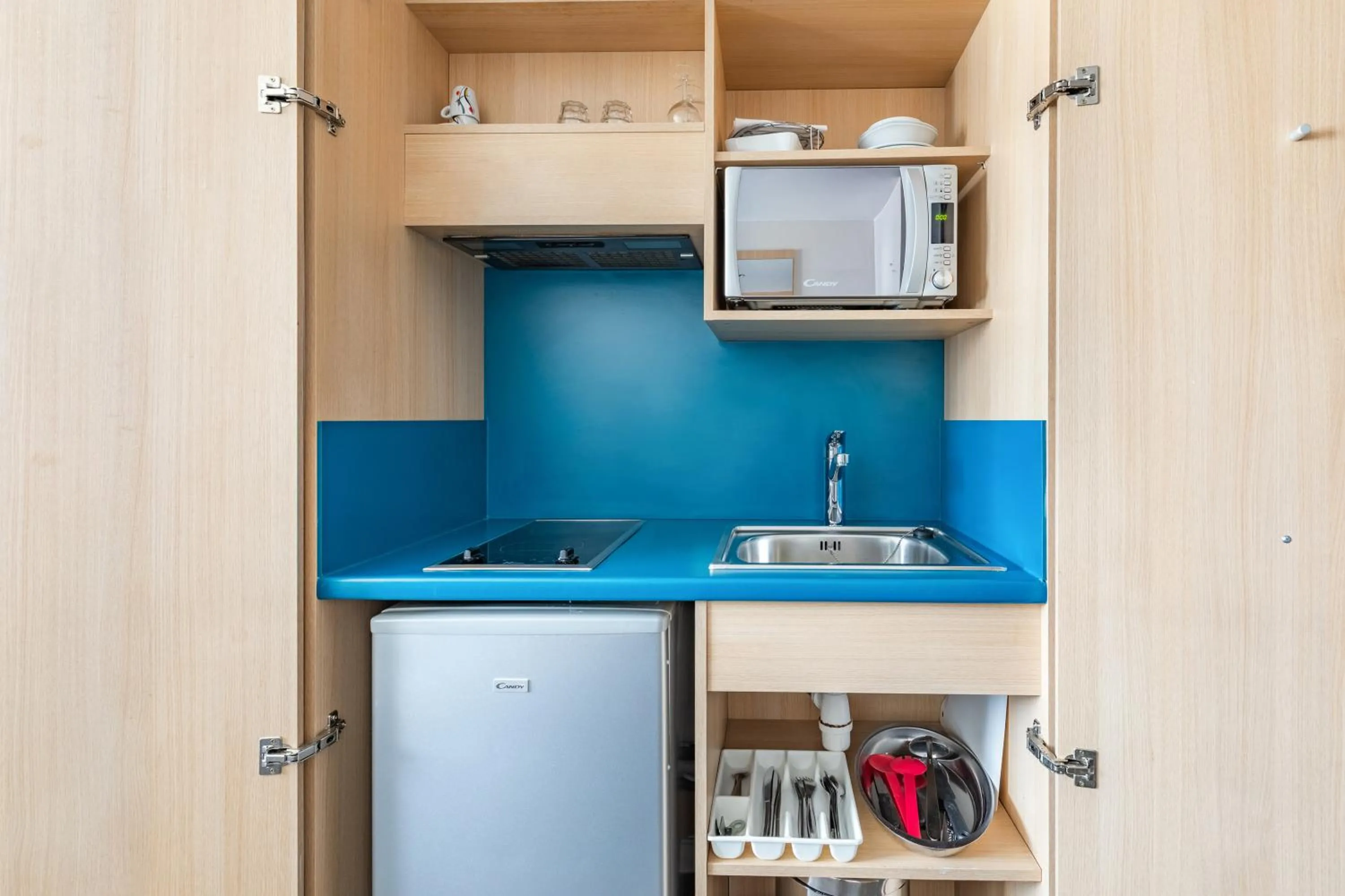 Kitchen or kitchenette in Appart’City Confort Lyon Cité Internationale