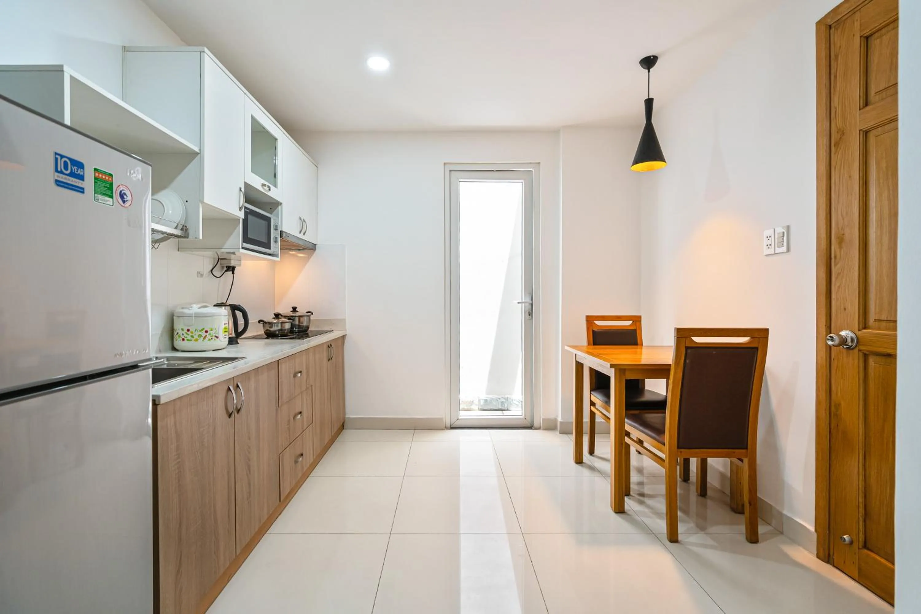 Kitchen or kitchenette in SaigonOne Serviced Apartment