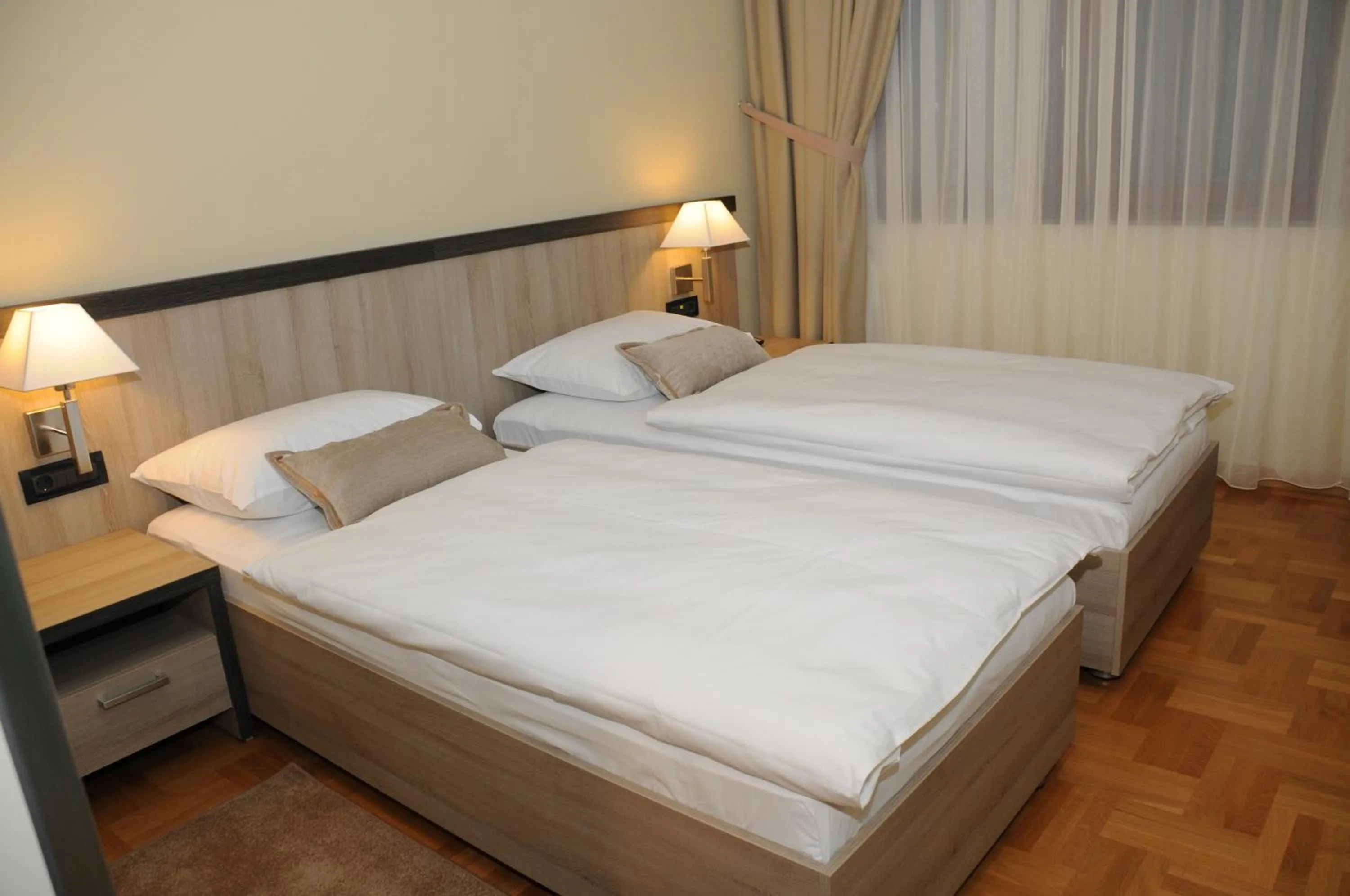 Bed in Hotel Calypso