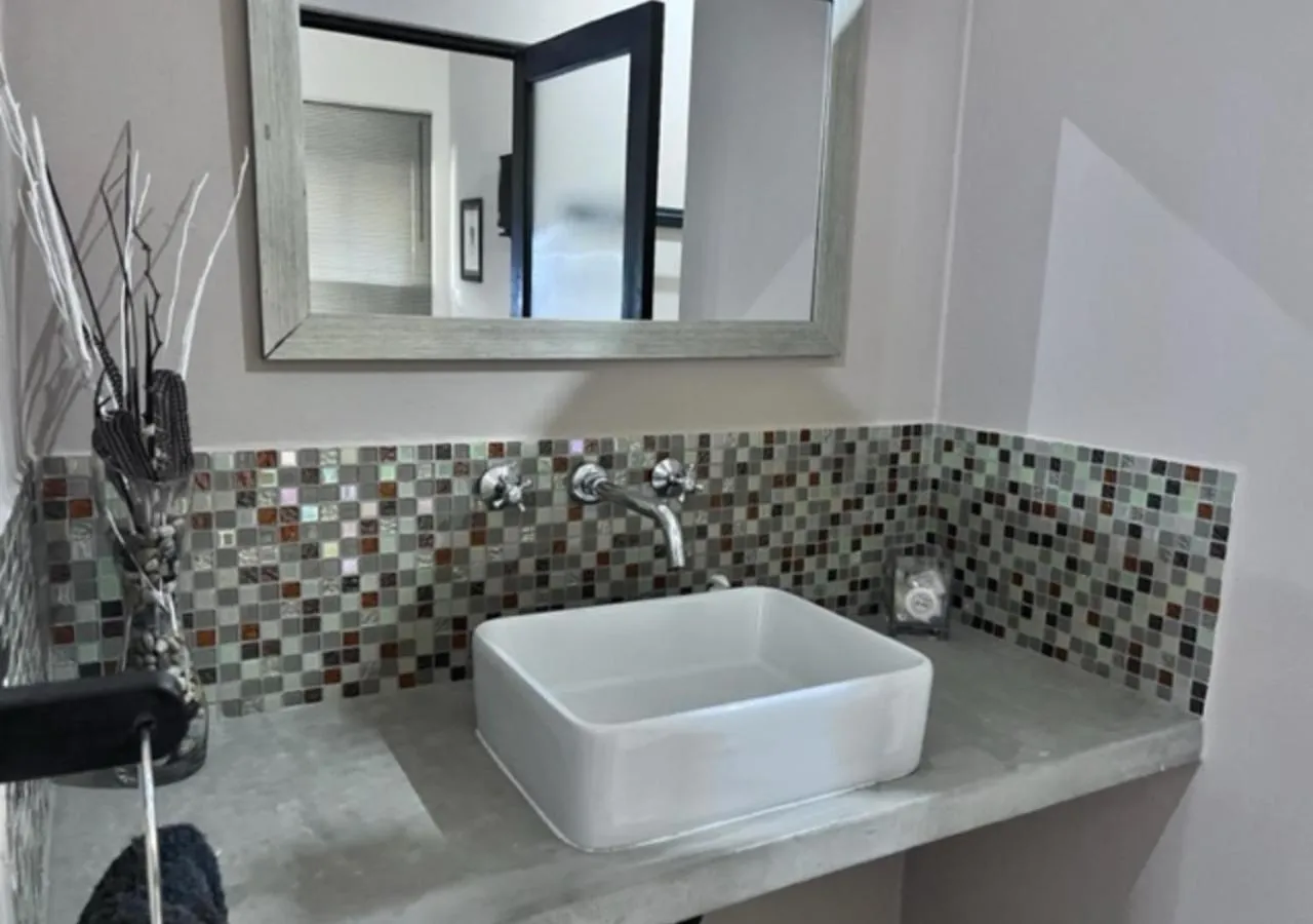 Bathroom in Turaco Lodge - No Loadshedding