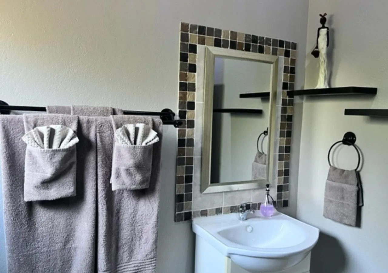 Bathroom in Turaco Lodge - No Loadshedding