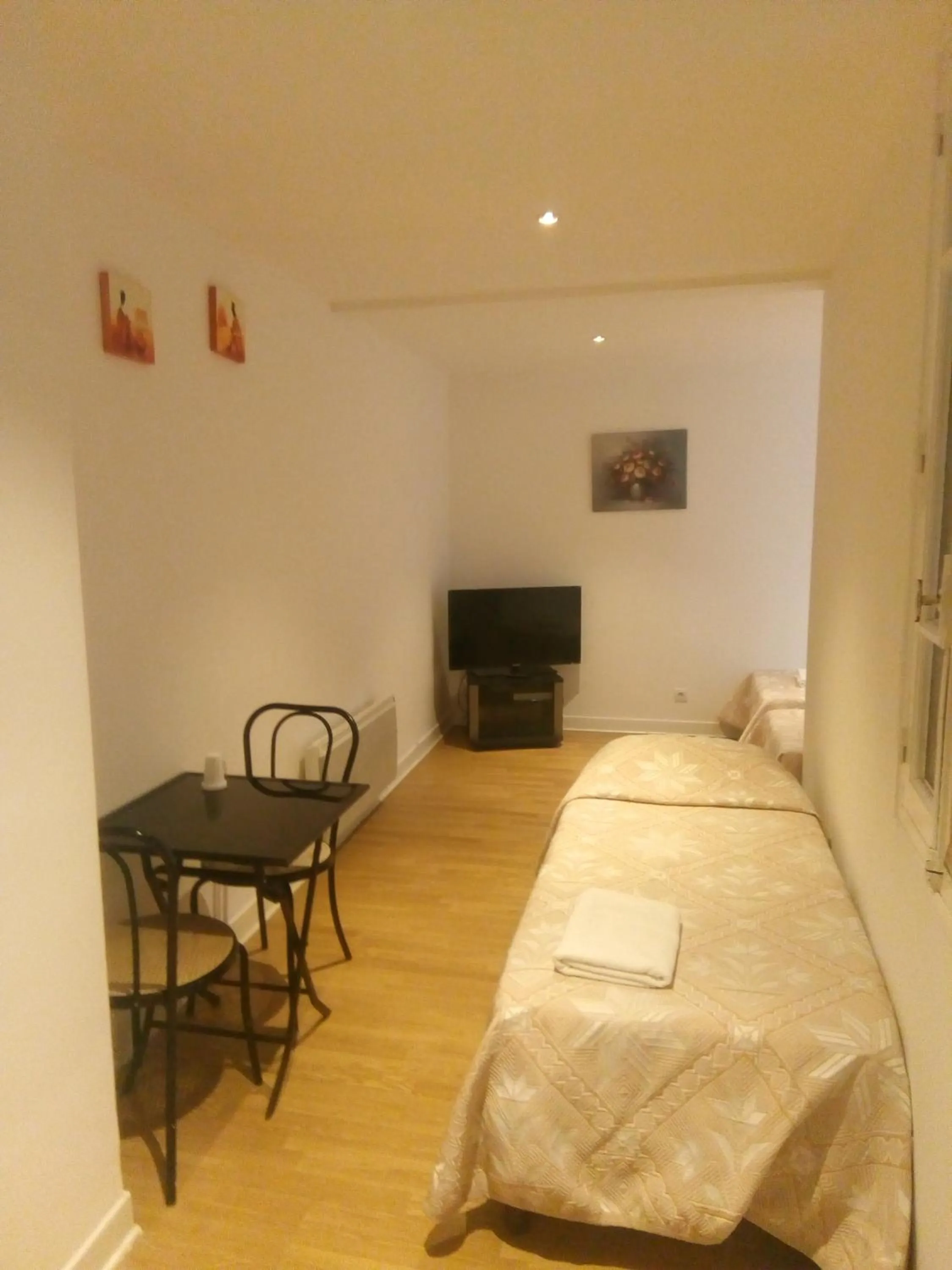 Photo of the whole room, Bed in Hôtel Croix des Nordistes