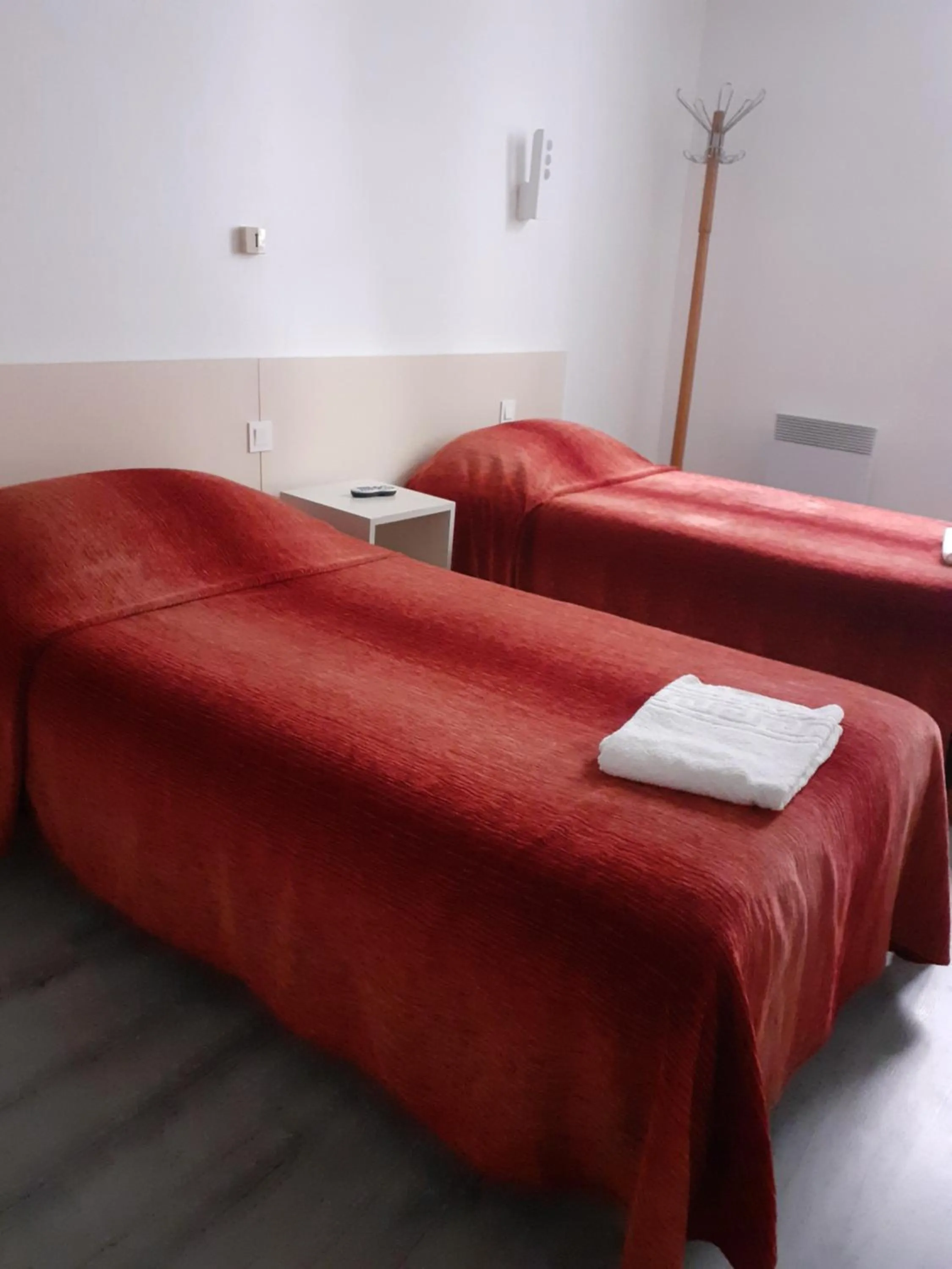 Bed in Hôtel Croix des Nordistes