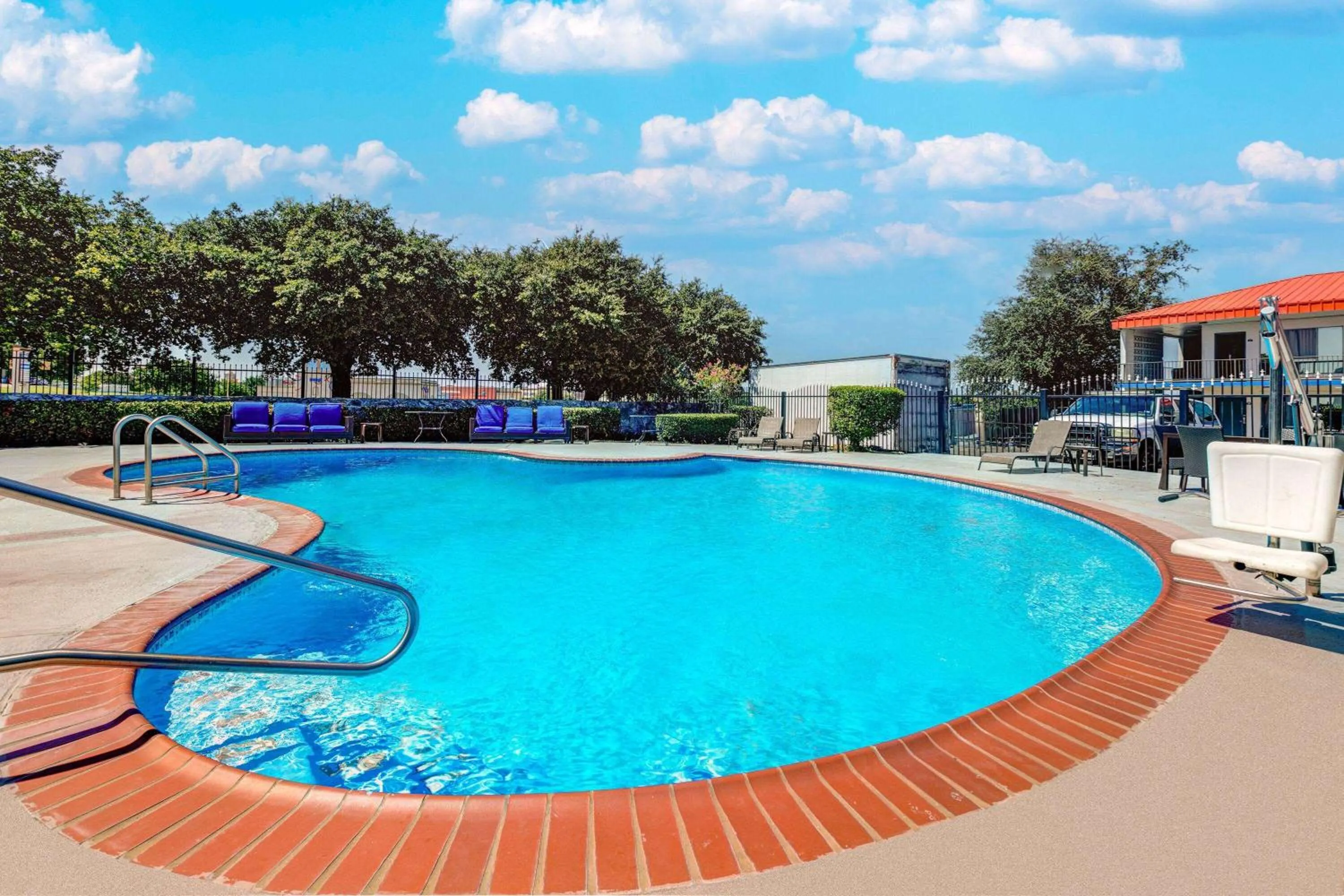Swimming pool in Days Inn by Wyndham South Fort Worth