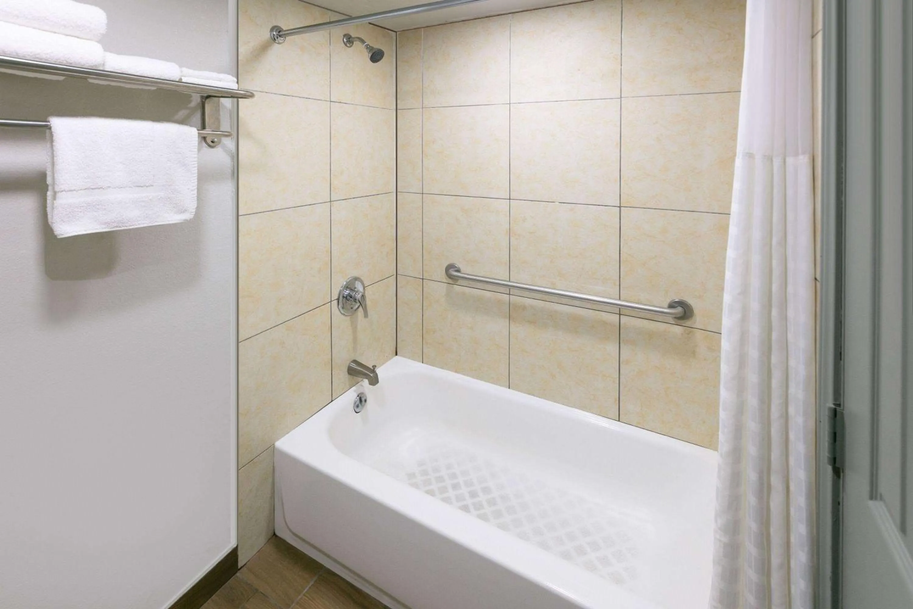 Bathroom in Days Inn by Wyndham South Fort Worth