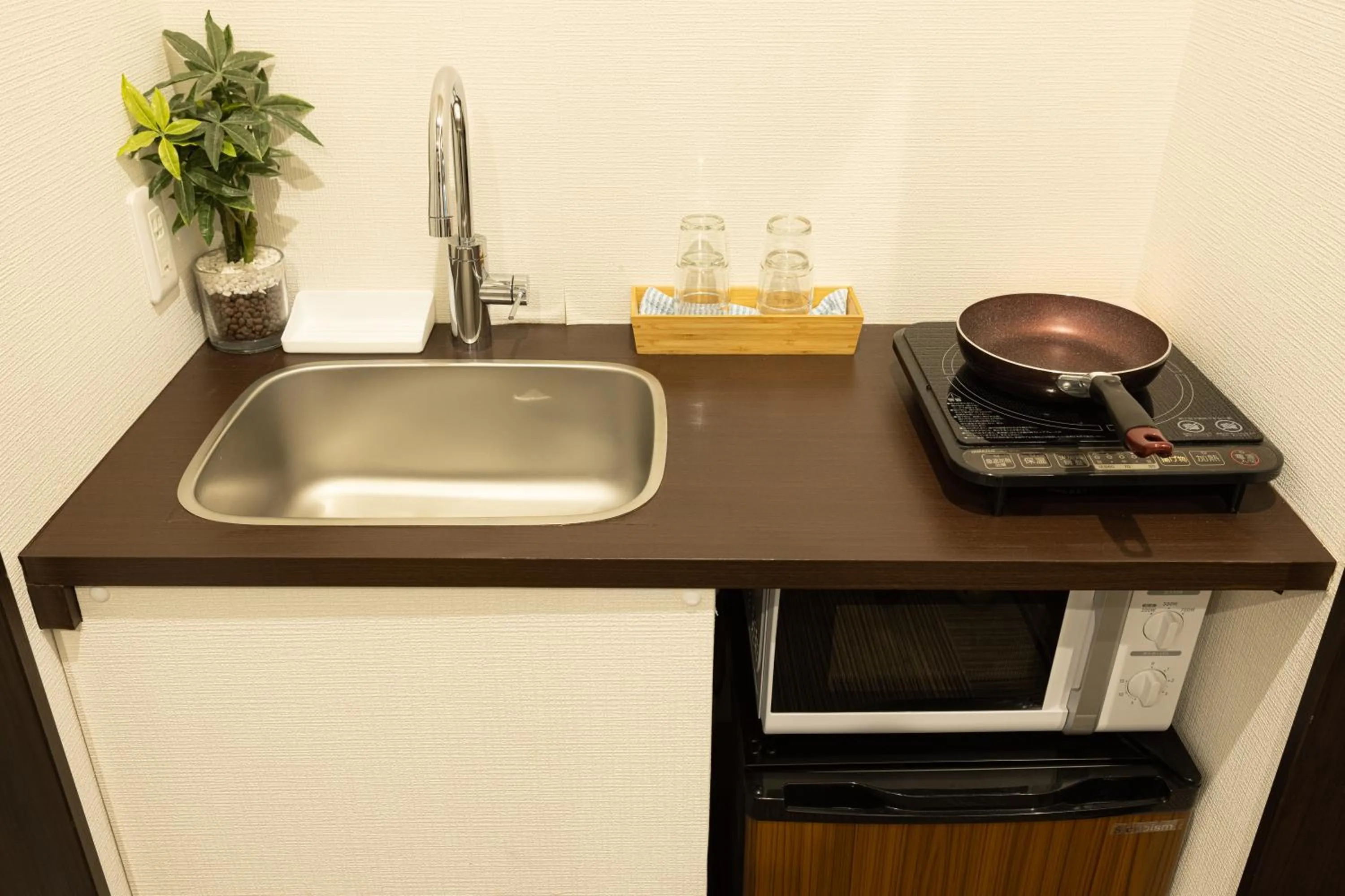 Kitchen or kitchenette in Hotel Tohko HakataGion