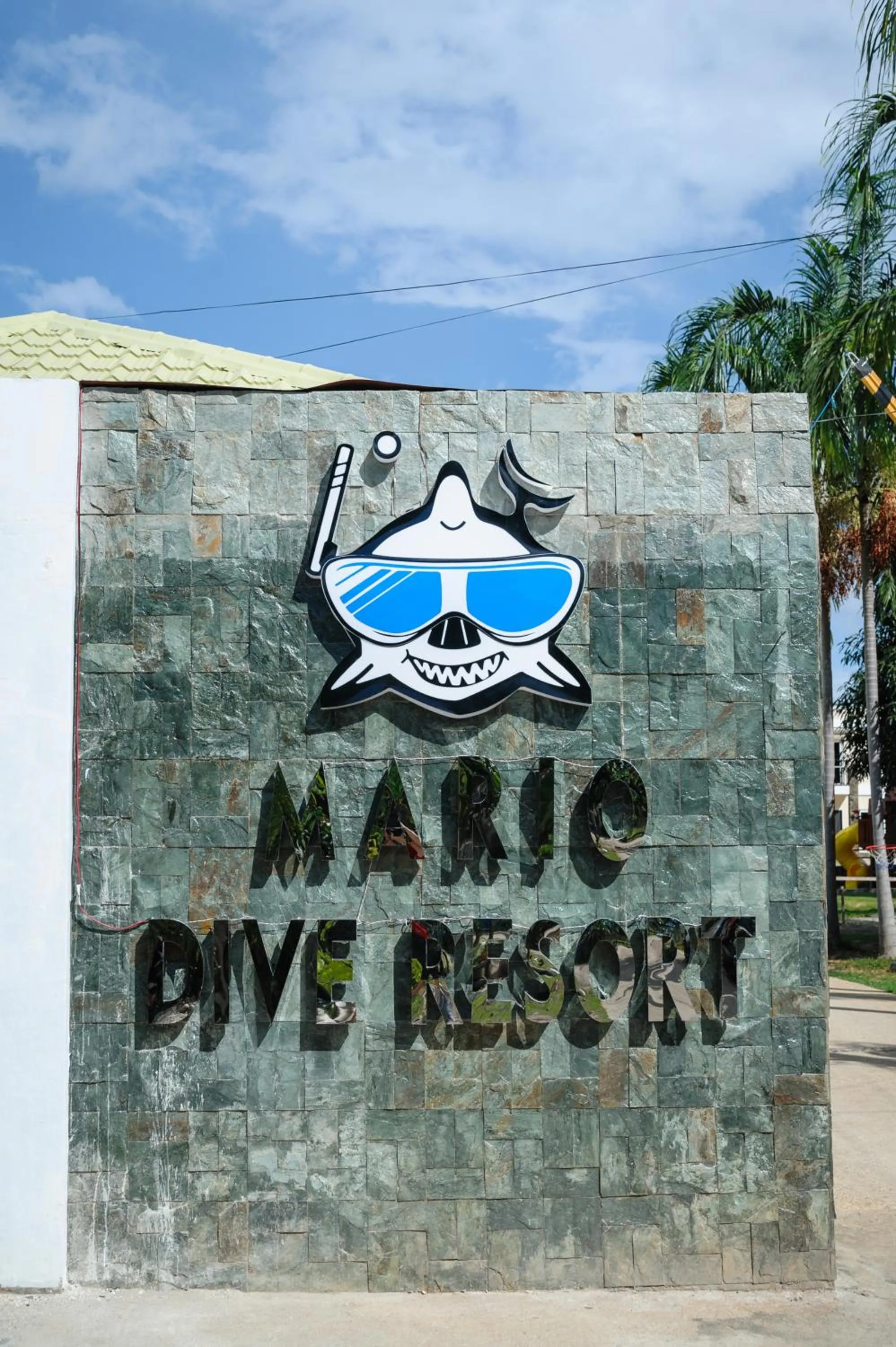 Property logo or sign in Mario Dive Resort