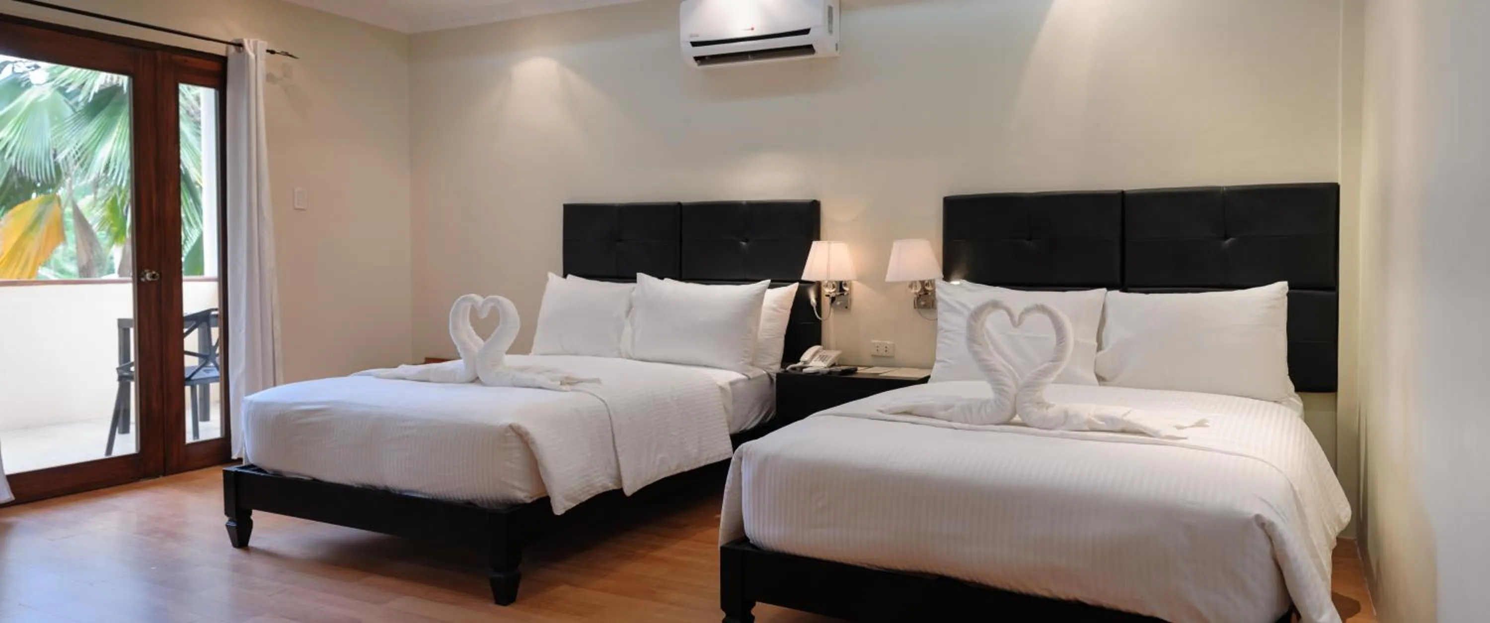 Bed in Mario Dive Resort