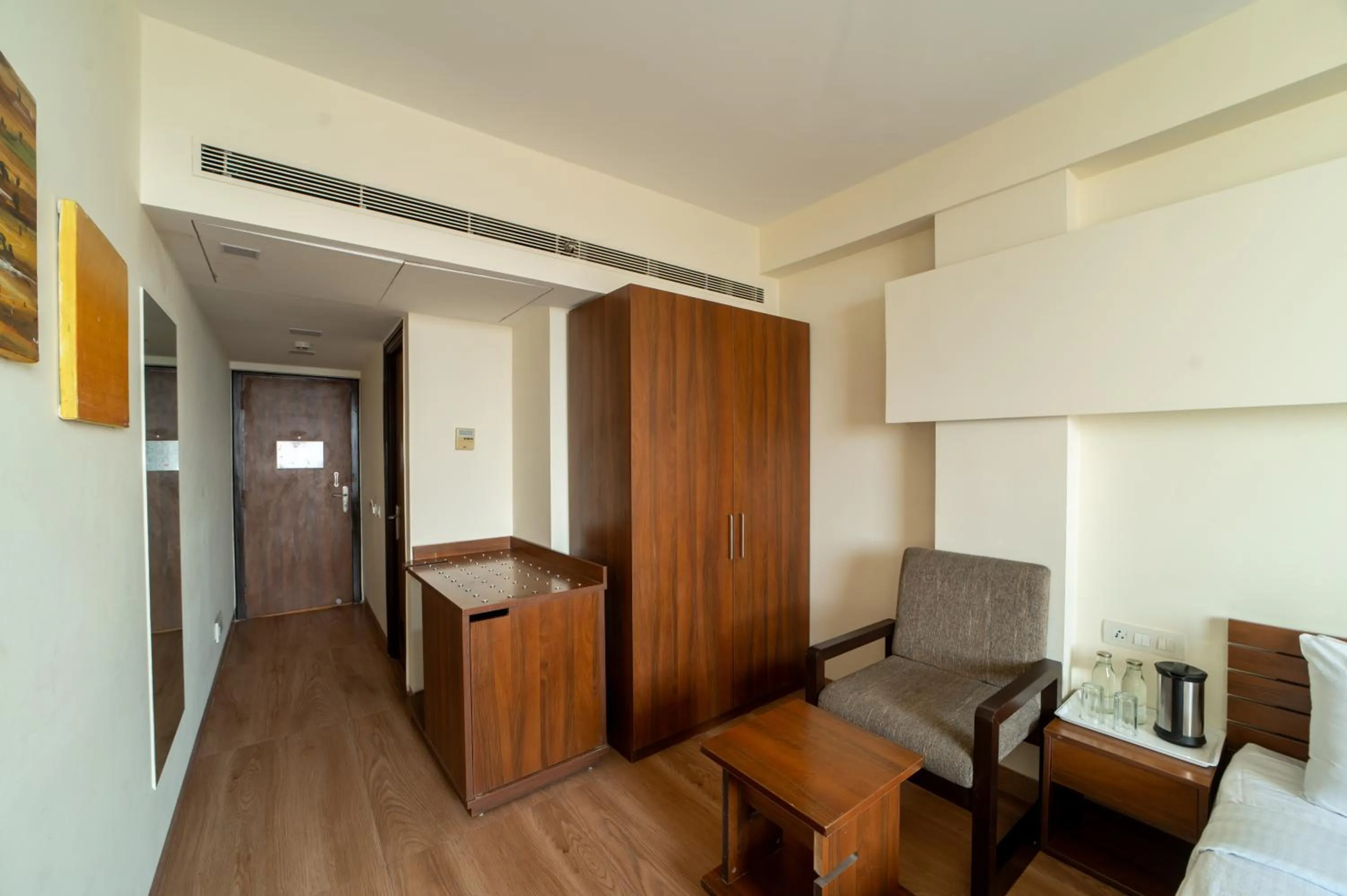 Bedroom in Whispering Palms Hotel Jaipur