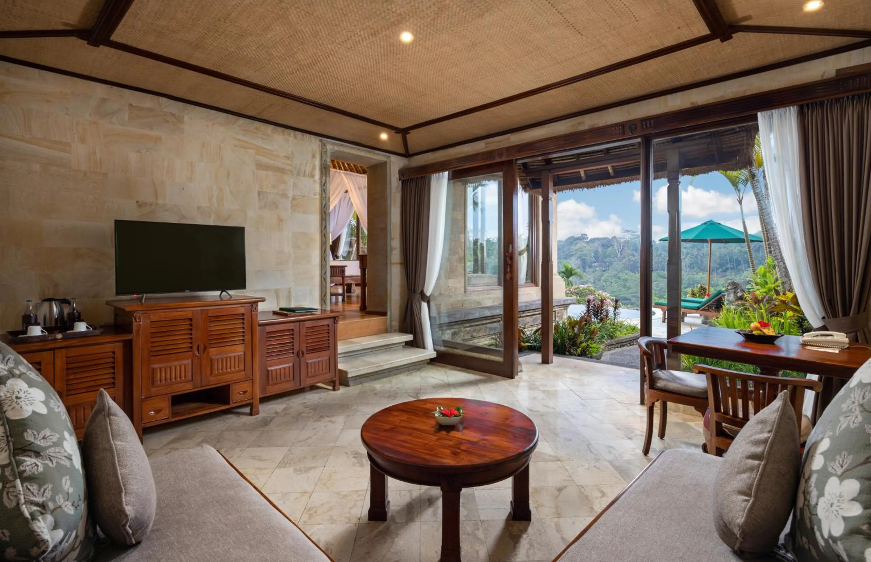 Communal lounge/ TV room in The Royal Pita Maha