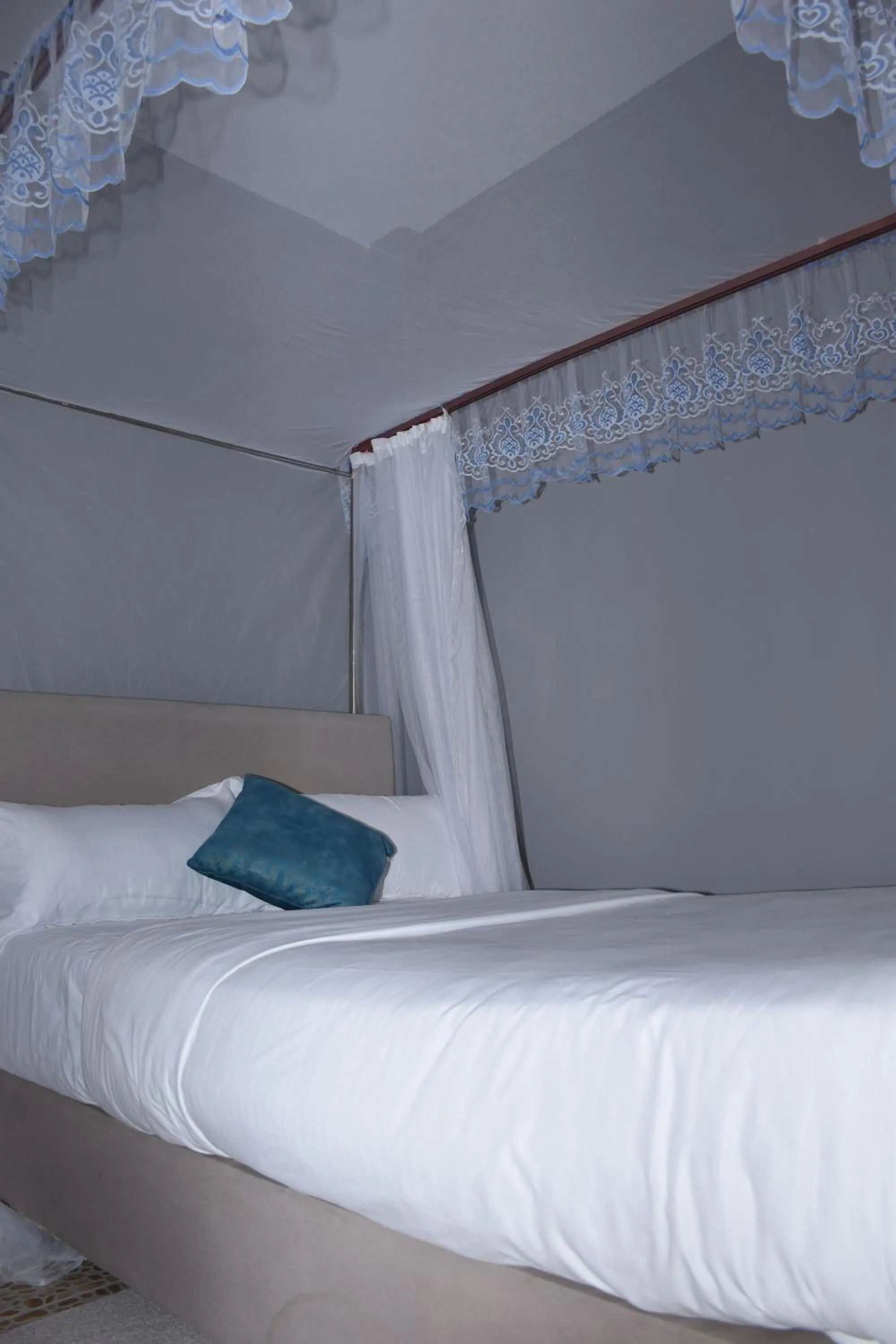 Bed in Zarita Boutique Hotel