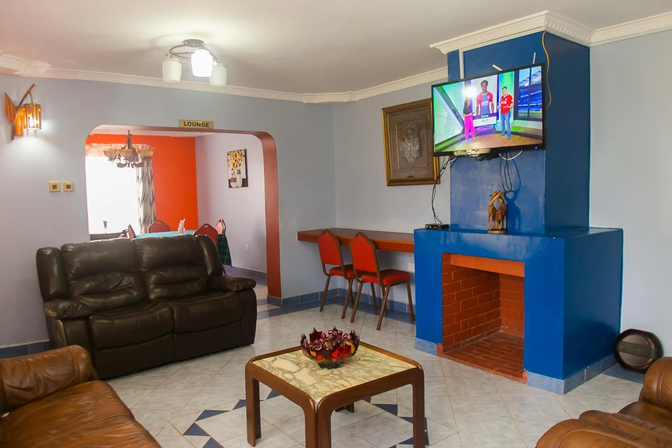 Communal lounge/ TV room in Zarita Boutique Hotel